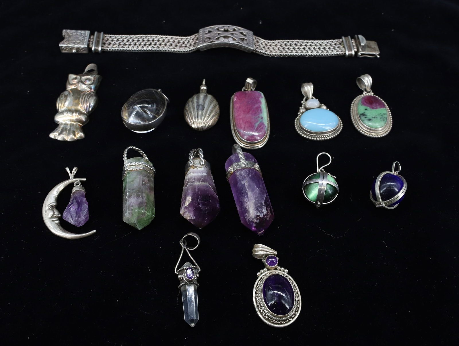 STERLING SILVER BRACELET AND PENDANTS: (14) MODERN HAND WROUGHT PENDANTS WITH HARD STONES AND QUARTZ, STERLING OWL PENDANT,SHELL PENDANT, HEAVY BRACELET WEIGHT FOR BRACELET, TWO STERLING PENDANTS 2.55 OZT PLUS STERLING MOUNTS ON STONE PEND