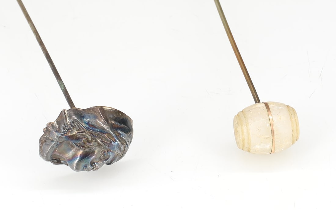 (2) STERLING SILVER HAT PIN AND STANHOPE: ART NOUVEAU FEMALE FACE 9 1/8"L, HARDSTONE BARREL WITH NIAGRA FALLS STANHOPE 6 5/8" PLEASE READ CAREFULLY - ITEMS MUST BE PAID FOR THROUGH LIVE AUCTIONEERS OR WITH CASH OR CHECK IN PERSON - Terms for