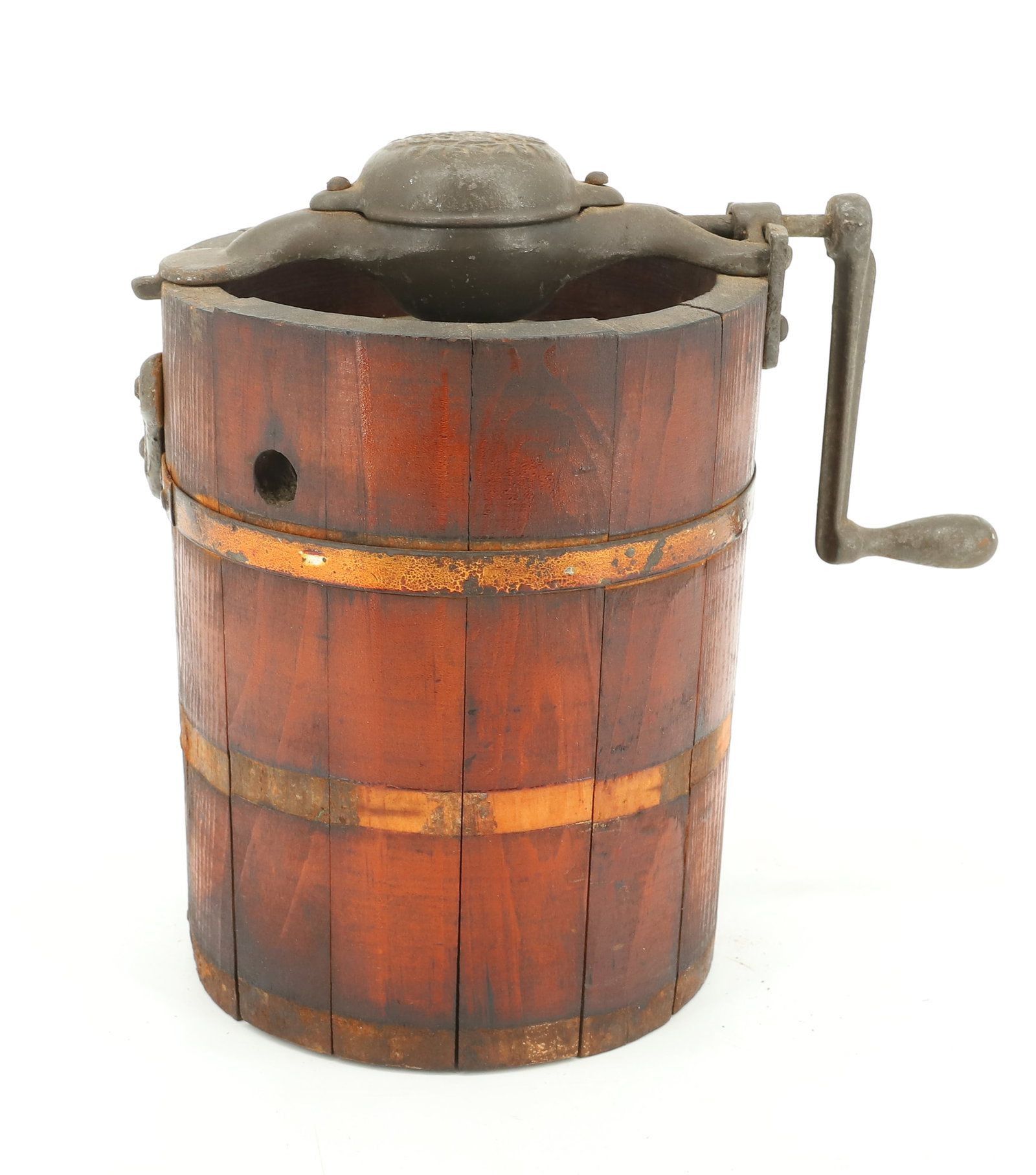 PEERLESS "ICELAND" ICE CREAM FREEZER: SMALL-SIZE WOODEN ICE CREAM TUB WITH CAST METAL TOP AND CRANK. 7 1/4" H. PLEASE READ CAREFULLY - ITEMS MUST BE PAID FOR THROUGH LIVE AUCTIONEERS OR WITH CASH OR CHECK IN PERSON - Terms for