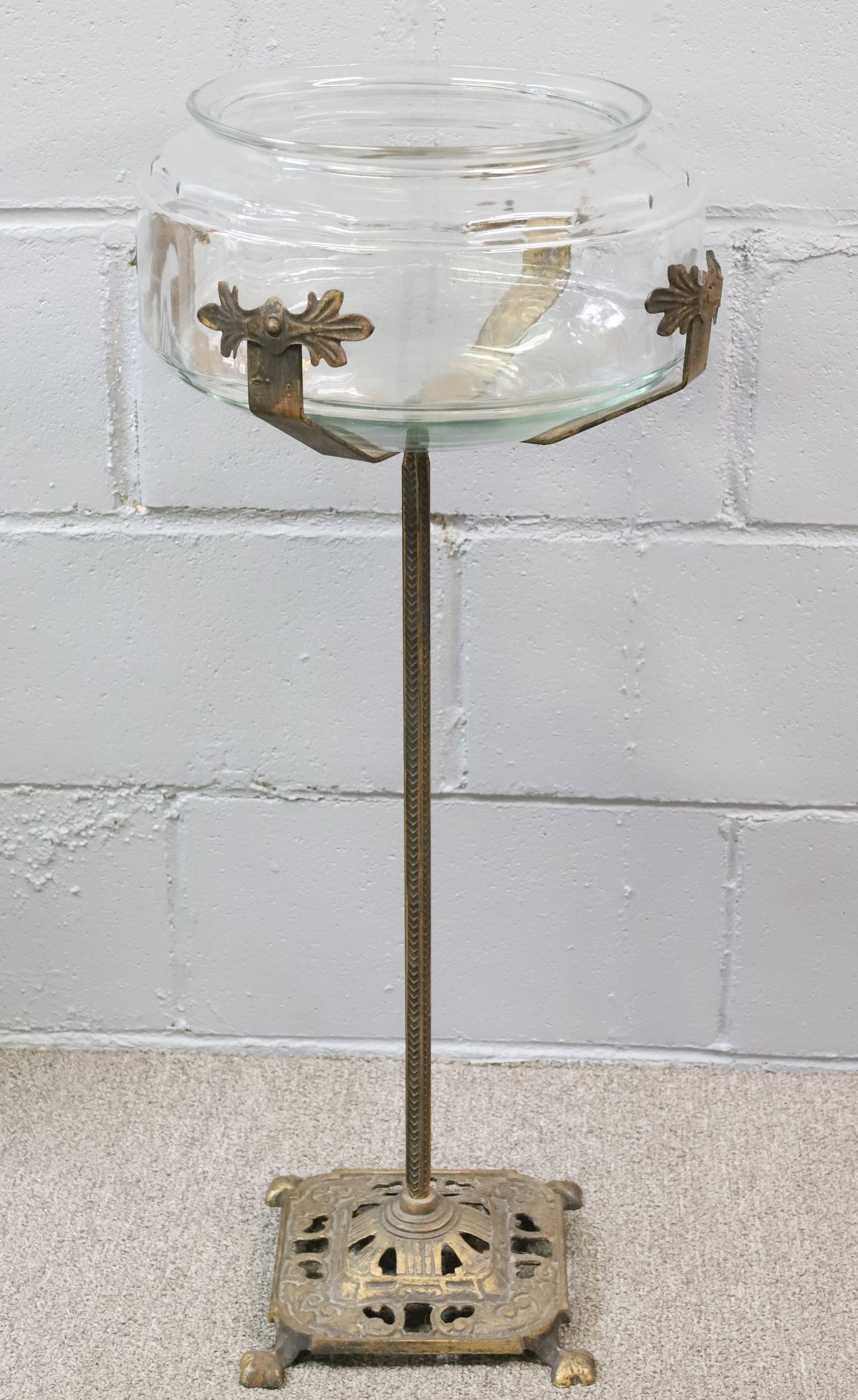 CAST IRON STAND AND FISH BOWL: ART DECO-STYLE GILT IRON BASE WITH GLASS BOWL. PLUS, 1940/50S AQUARIUM/FISH BOOKS. 30" X 13". PLEASE READ CAREFULLY - ITEMS MUST BE PAID FOR THROUGH LIVE AUCTIONEERS OR WITH CASH OR CHECK IN