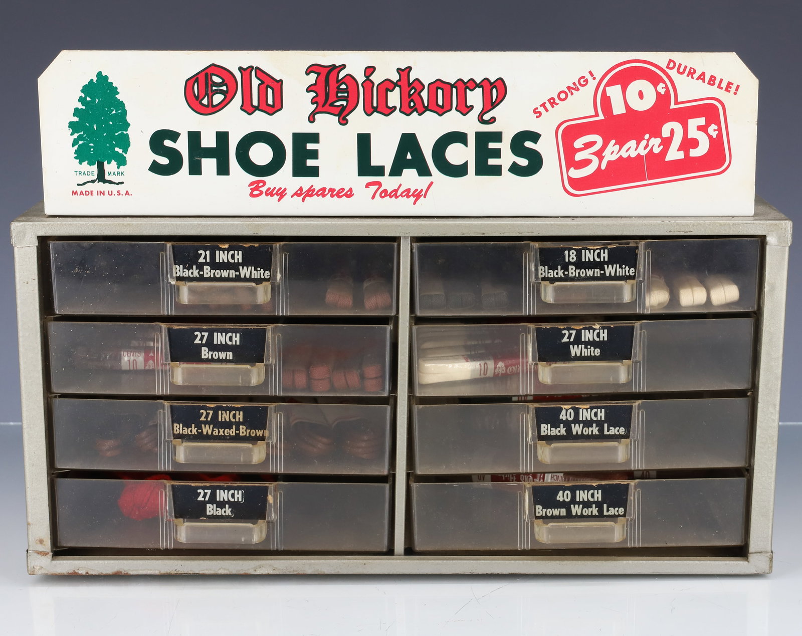 "OLD HICKORY SHOE LACES" DISPLAY: TIN / PLASTIC WITH EIGHT DRAWERS. 8 3/4" X 12 1/2" X 6". PLEASE READ CAREFULLY - ITEMS MUST BE PAID FOR THROUGH LIVE AUCTIONEERS OR WITH CASH OR CHECK IN PERSON - Terms for Purchasing and