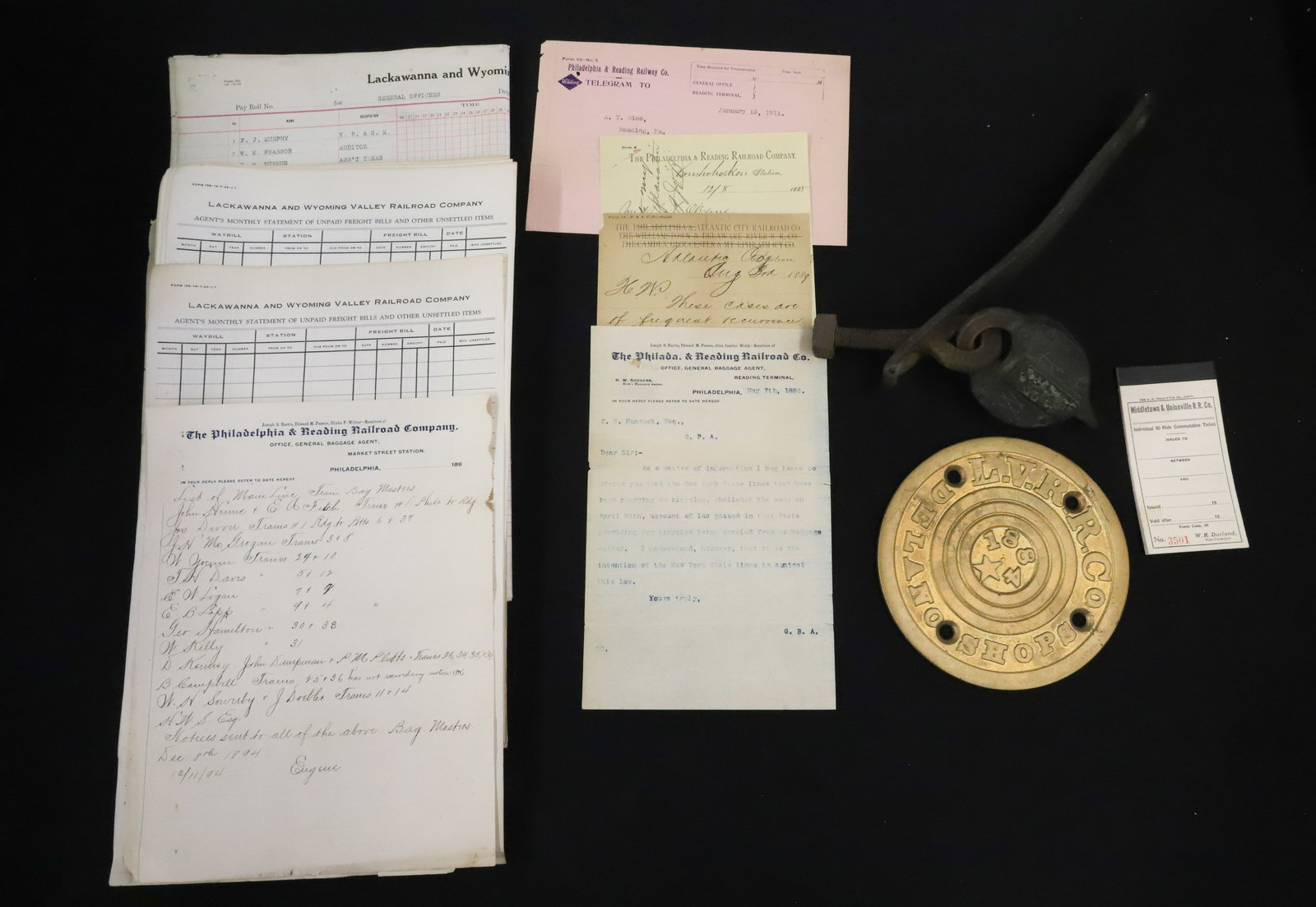 LOT OF RAILROAD RELATED ITEMS: INCLUDING: LVRR DELANO SHOPS CAST IRON PLACARD 5 7/8" D. RAILROAD LOCK "WB" WITH IRON LATCH (NO KEY). PLUS, VARIETY OF ANTIQUE RAILROAD PAPER. PLEASE READ CAREFULLY - ITEMS MUST BE PAID FOR THROUGH LI