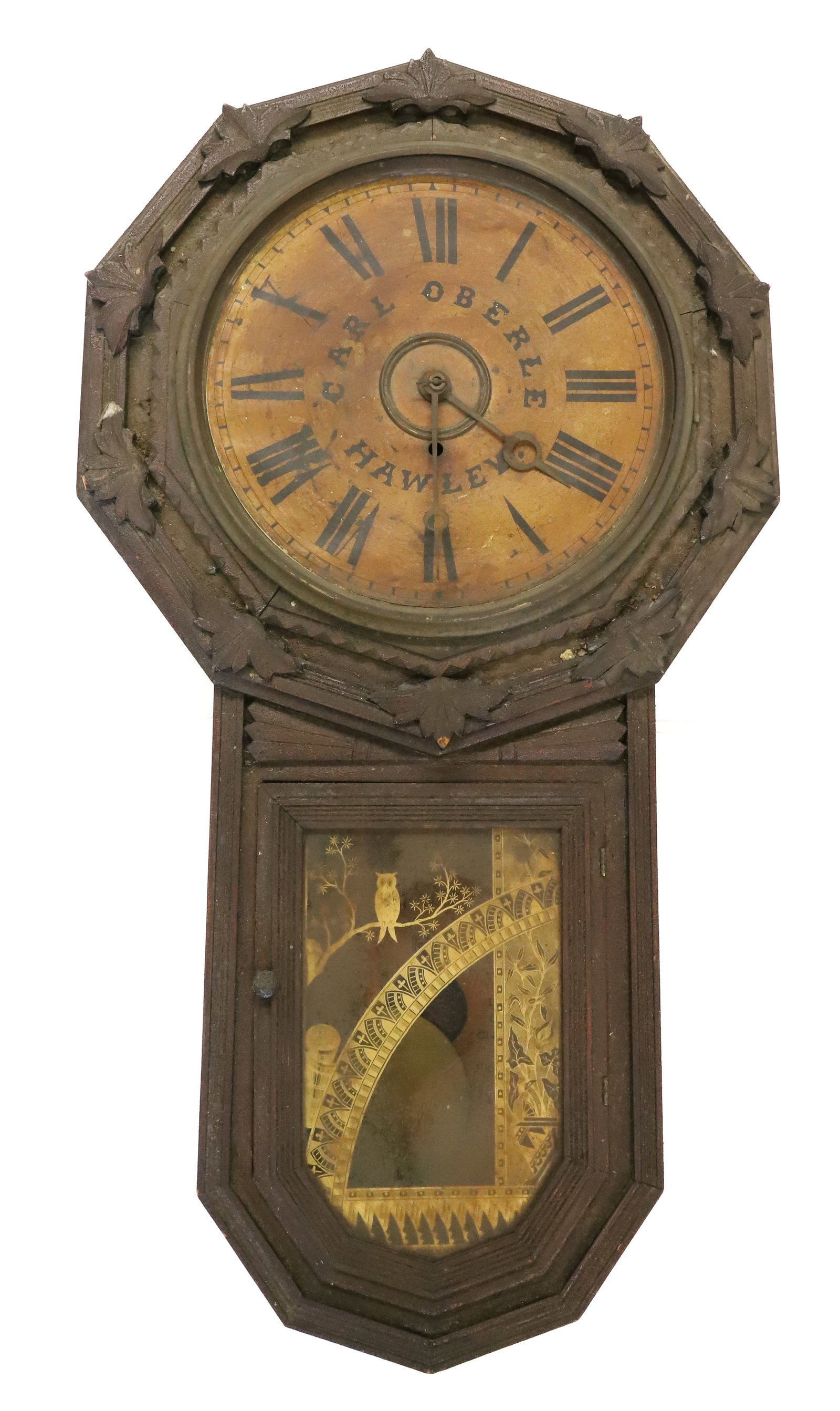 ANTIQUE GILBERT WALL CLOCK, HAWLEY, PA: PAPER DIAL MRKD. "CARL OBERLE, HAWLEY" ABOVE GLASS DOOR WITH OWL MOTIF. INCLUDES KEYS AND PENDULUM. LARGE INTERIOR LABEL. ALSO, LABELED ON BACK "STAR DROP, MANUFACTURED BY WM. L. GILBERT CLOCK CO., WI