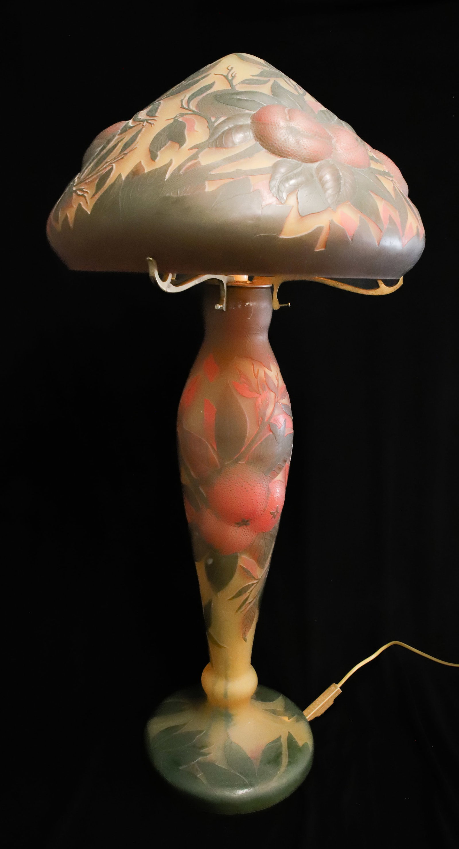 LARGE GALLE-STYLE CAMEO GLASS LAMP: ORANGE AND LEAF MOTIF ON SHADE AND MATCHING BASE. BASE IS 23 1/2" H. SHADE IS 9 1/2" X 16". (APPROX. 33" TOTAL HEIGHT). HAS EUROPEAN PLUG (NEEDS RE-WIRE OR ADAPTER) PLEASE READ CAREFULLY - ITEMS MUST 