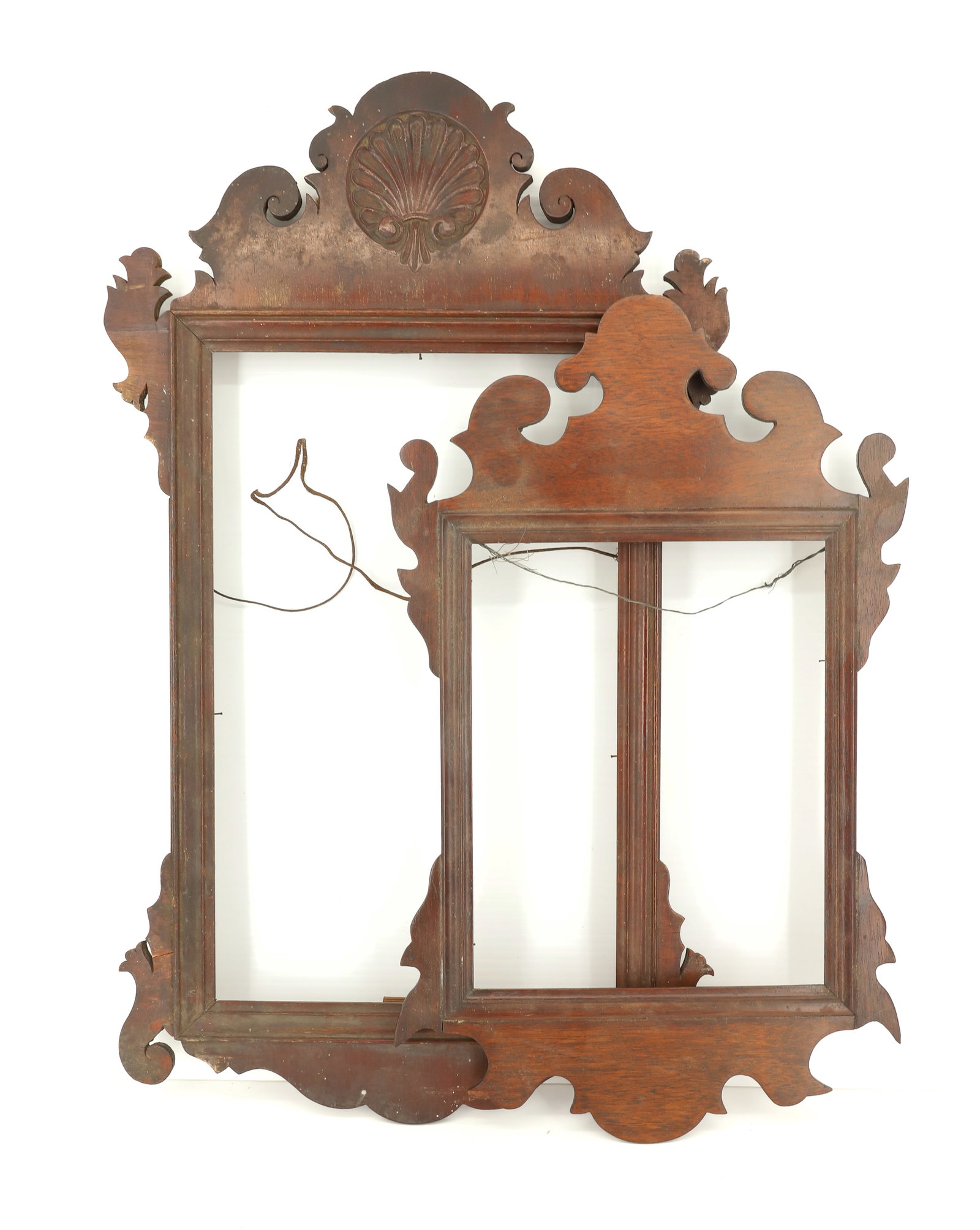 (2) CHIPPENDALE-STYLE MIRROR FRAMES: LARGER HAS SHELL CARVING AT TOP. 25 1/4" X 15". INTERIOR 16 3/8" X 10 1/2". SMALLER 20" X 12 1/8". INTERIOR 11" X 8 1/2". PLEASE READ CAREFULLY - ITEMS MUST BE PAID FOR THROUGH LIVE