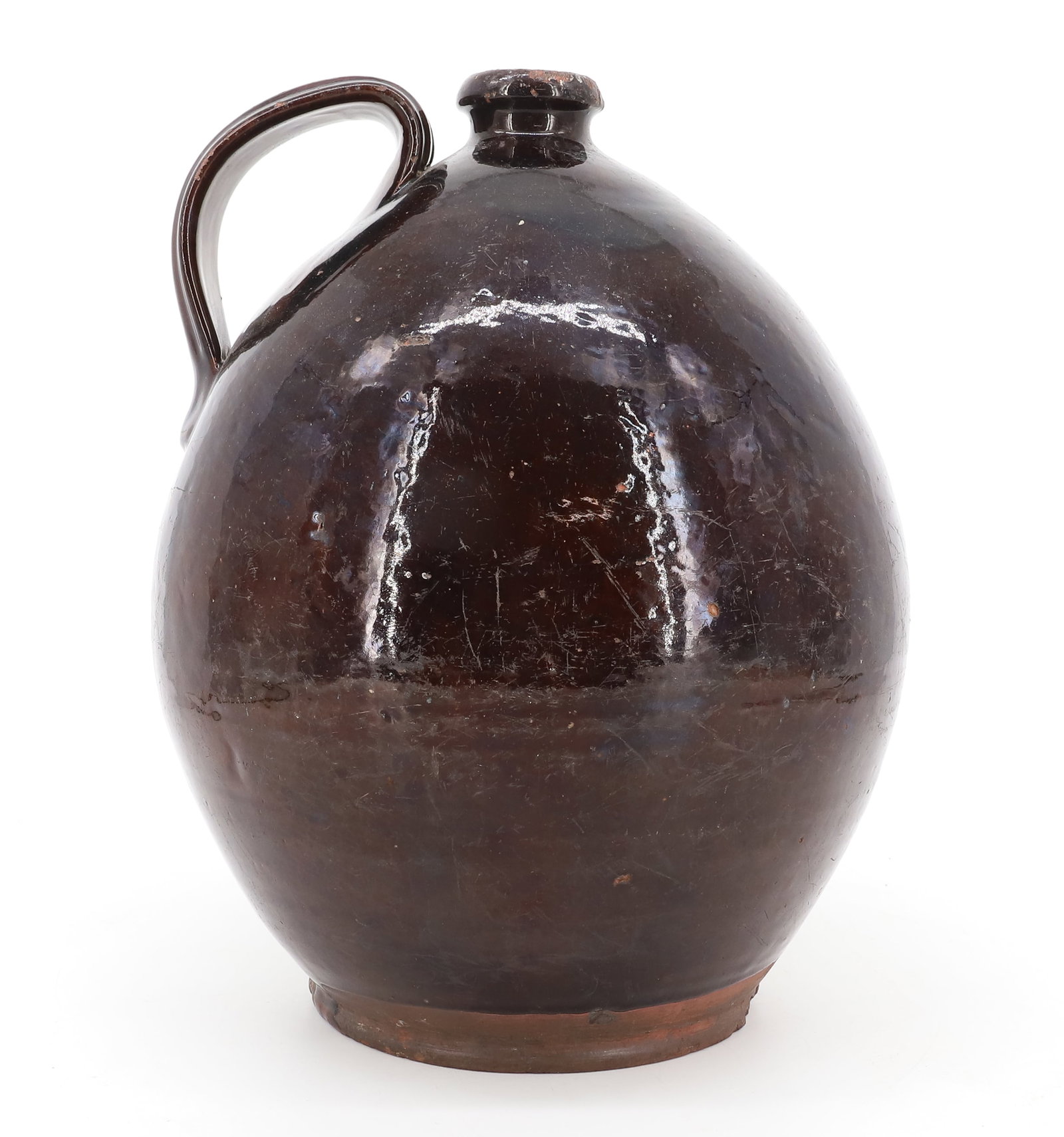 LARGE OVOID POTTERY JUG: DARK BROWN GLAZE. LARGE SIZE WITH APPLIED STRAP HANDLE. 13" H. PLEASE READ CAREFULLY - ITEMS MUST BE PAID FOR THROUGH LIVE AUCTIONEERS OR WITH CASH OR CHECK IN PERSON - Terms for Purchasing and Shippi