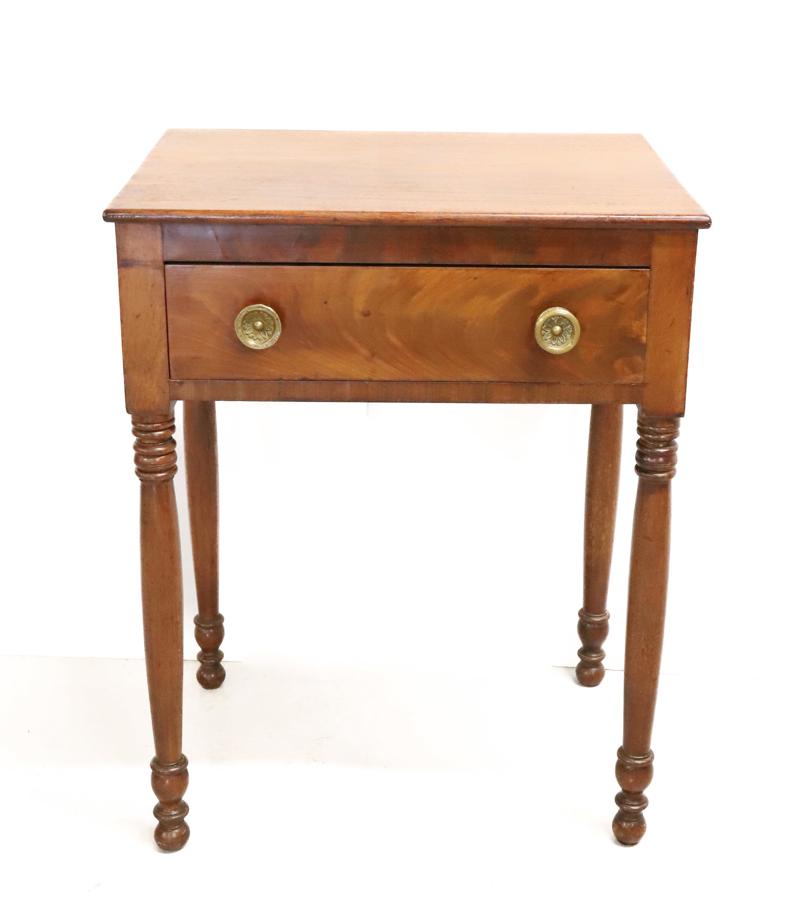 19TH C. ONE-DRAWER STAND: MAHOGANY VENEER. DOVETAILED DRAWER WITH TURNED LEGS. PRESSED BRASS KNOBS. 28 1/2" X 22 1/2" X 17". PLEASE READ CAREFULLY - ITEMS MUST BE PAID FOR THROUGH LIVE AUCTIONEERS OR WITH CASH OR CHECK