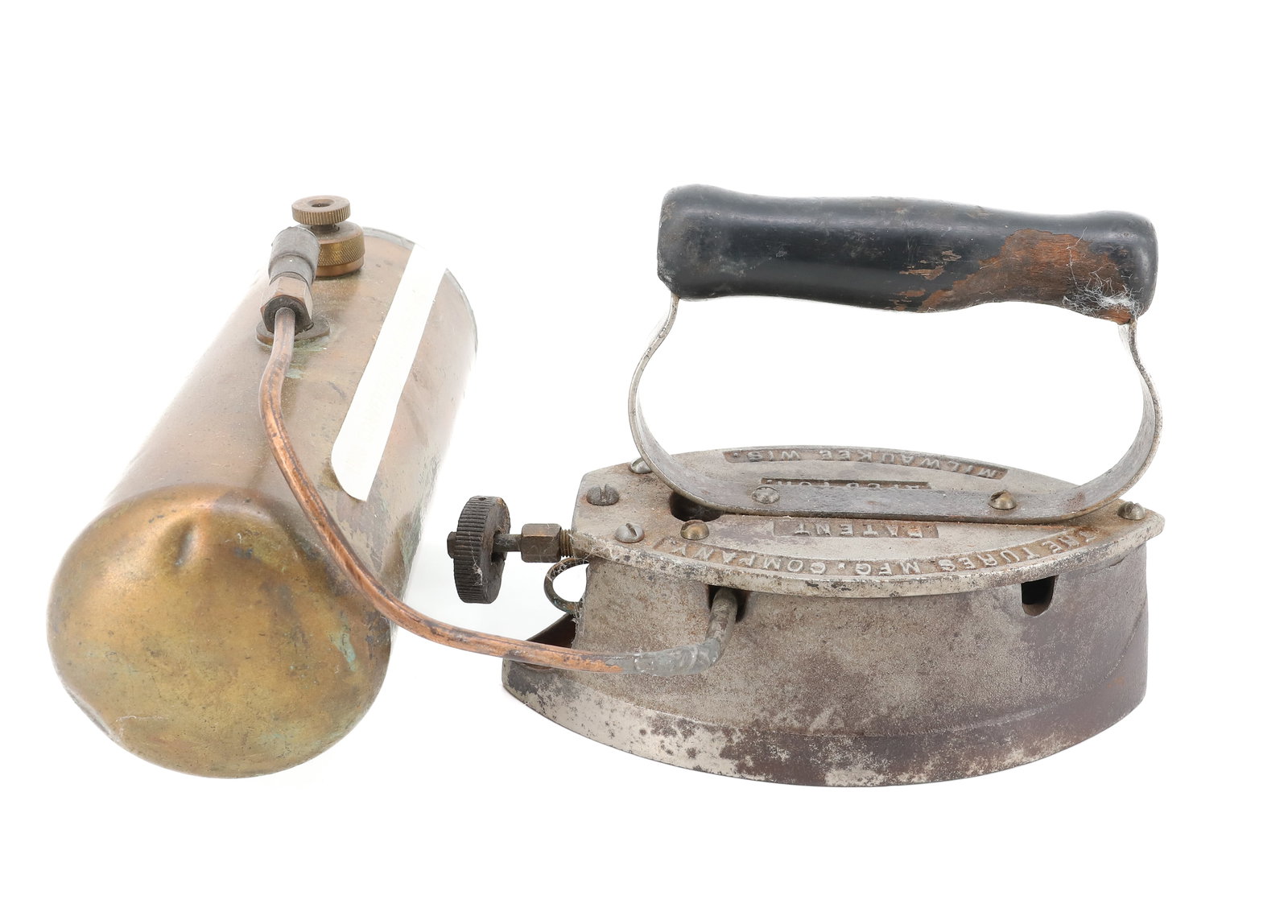 CONVERTED GAS IRON: TURES MFG. CO. MILWAUKEE, WI. GAS IRON CONVERTED TO A SUPER TANKER GAS IRON. CA. 1900. 7" L. PLEASE READ CAREFULLY - ITEMS MUST BE PAID FOR THROUGH LIVE AUCTIONEERS OR WITH CASH OR CHECK IN PERSON -