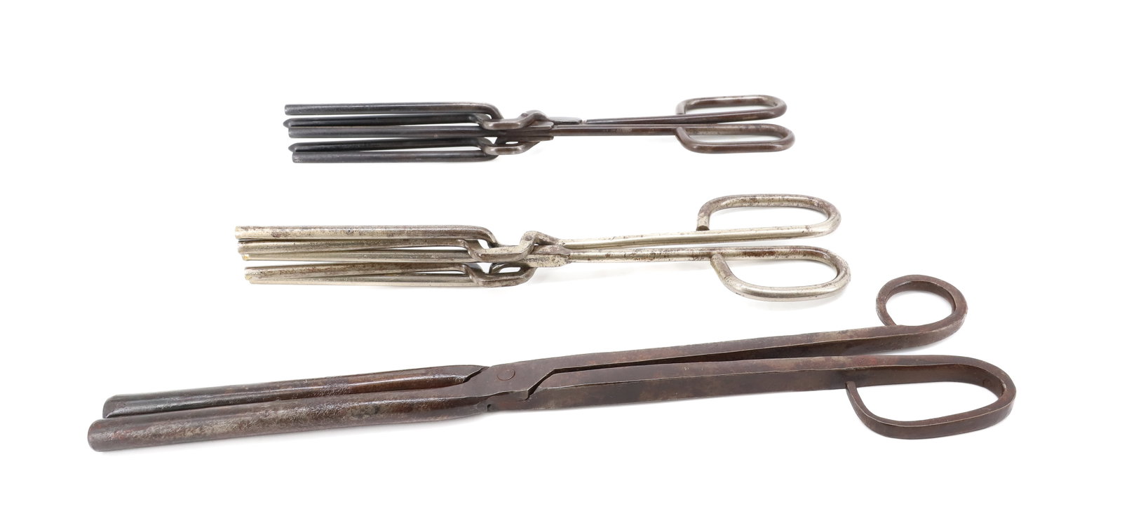 (3) FLUTING IRONS: WROUGHT IRON WITH SCISSOR HANDLES. LARGEST 13 3/4" L. PLEASE READ CAREFULLY - ITEMS MUST BE PAID FOR THROUGH LIVE AUCTIONEERS OR WITH CASH OR CHECK IN PERSON - Terms for Purchasing and Shipping of