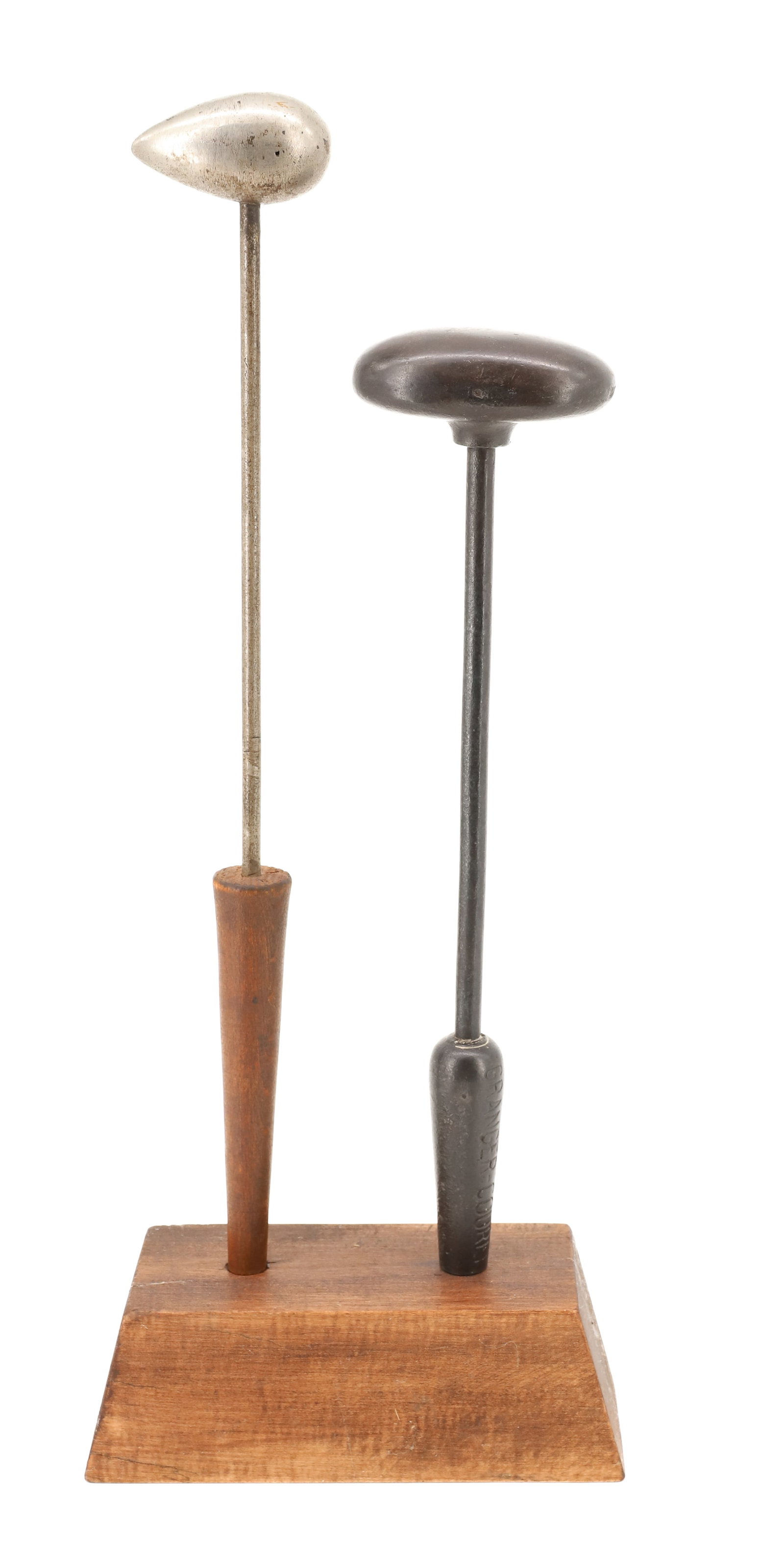 (2) 19TH C. EGG IRONS: MOUNTED ON WOODEN BASE. 3 1/2 AND 2 1/2" HEADS. 12" AND 14" HEIGHTS. PLEASE READ CAREFULLY - ITEMS MUST BE PAID FOR THROUGH LIVE AUCTIONEERS OR WITH CASH OR CHECK IN PERSON - Terms for Purchasing and 