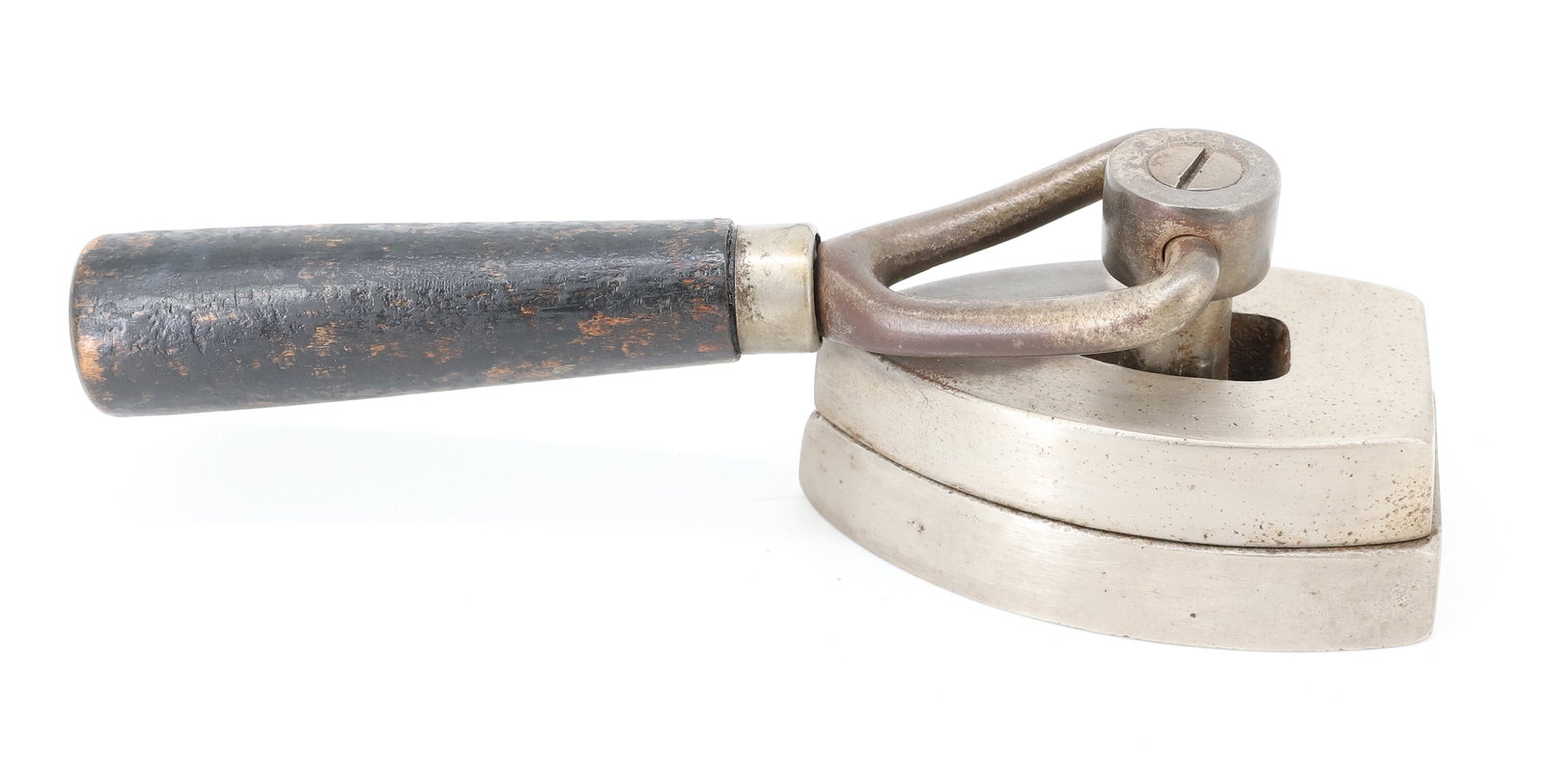 HAT IRON: LIFT-TOP WITH SWING HANDLE. UNMARKED. 3 1/2" L. PLEASE READ CAREFULLY - ITEMS MUST BE PAID FOR THROUGH LIVE AUCTIONEERS OR WITH CASH OR CHECK IN PERSON - Terms for Purchasing and Shipping of Auction