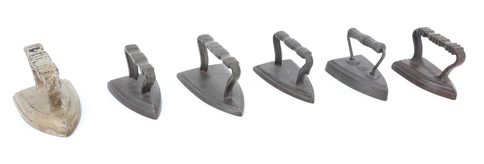 (6) SMALL SIZE FLAT IRONS: VARIOUS SIZED CHILDREN'S IRONS WITH CROSS RIBBED HANDLES. 3" TO 4" LENGTHS. PLEASE READ CAREFULLY - ITEMS MUST BE PAID FOR THROUGH LIVE AUCTIONEERS OR WITH CASH OR CHECK IN PERSON - Terms for Purchasi