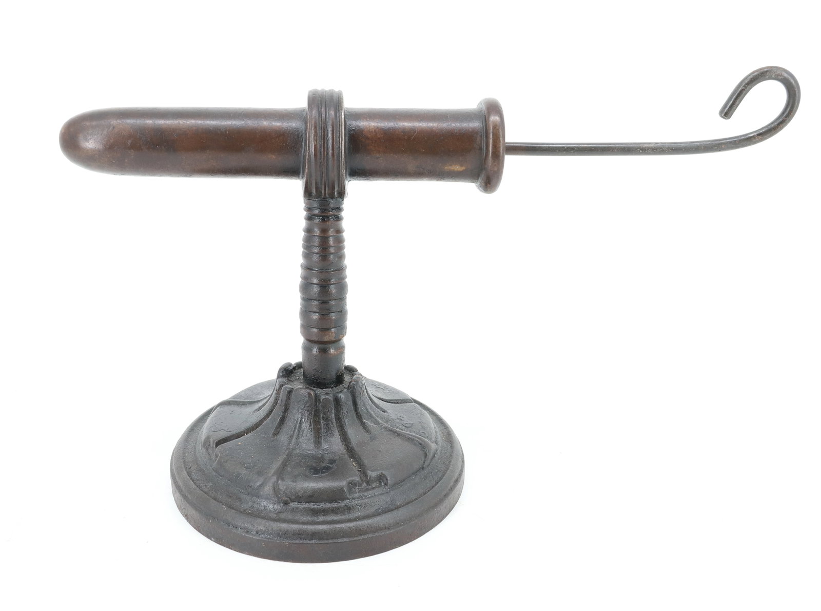 SINGLE BARREL ENGLISH GOFFERING IRON: CAST IRON EMBOSSED BASE. TURNED POST WITH 7 3/4" BARREL. WITH HEAT ROD. PLEASE READ CAREFULLY - ITEMS MUST BE PAID FOR THROUGH LIVE AUCTIONEERS OR WITH CASH OR CHECK IN PERSON - Terms for Purchasing a