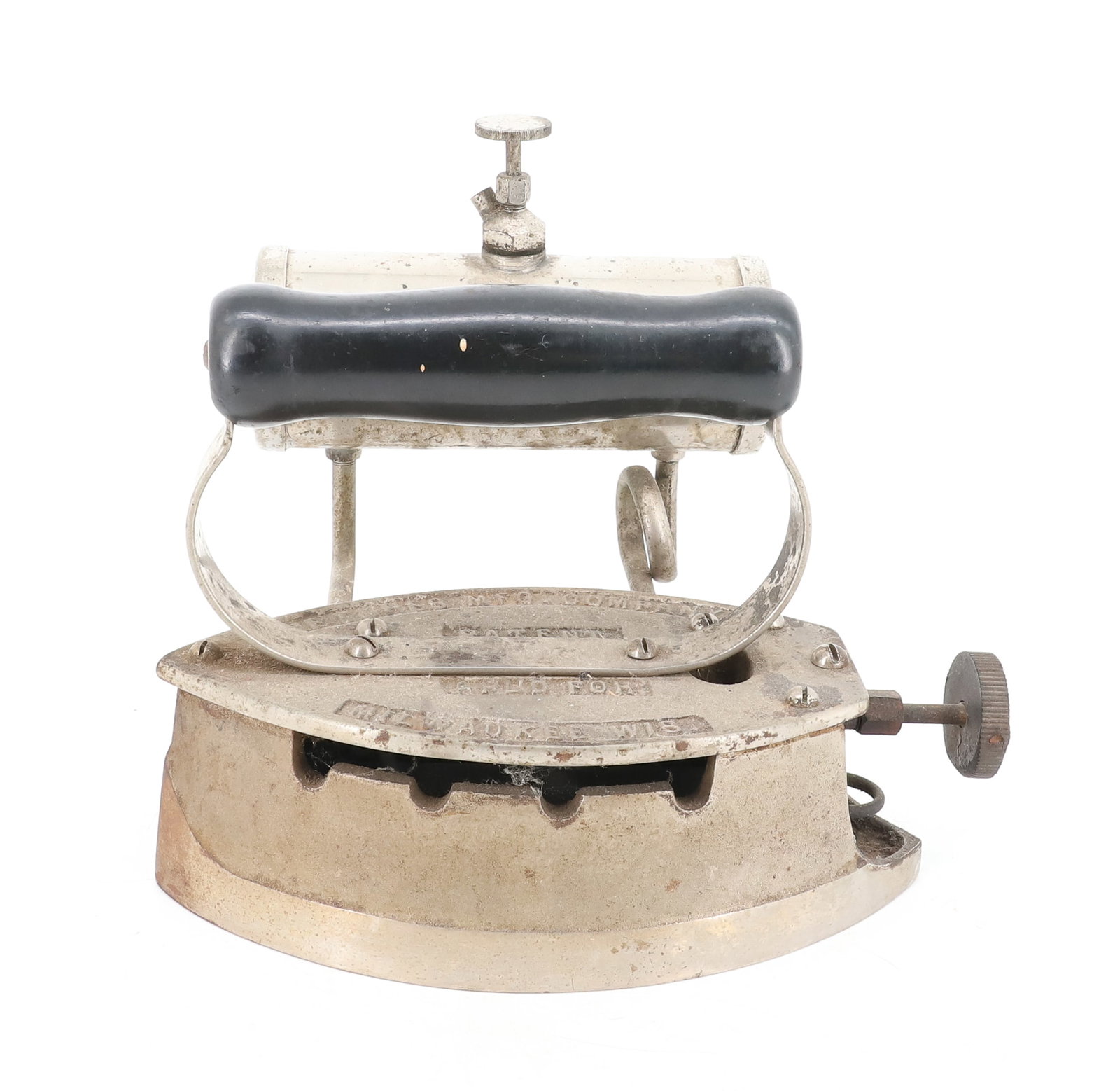 TURES LIQUID FUEL IRON: DOUBLE-POINT IRON WITH SIDE TANK. MILWAUKEE, WI, PATENT APPLIED FOR. 7 1/2" L. PLEASE READ CAREFULLY - ITEMS MUST BE PAID FOR THROUGH LIVE AUCTIONEERS OR WITH CASH OR CHECK IN PERSON - Terms for