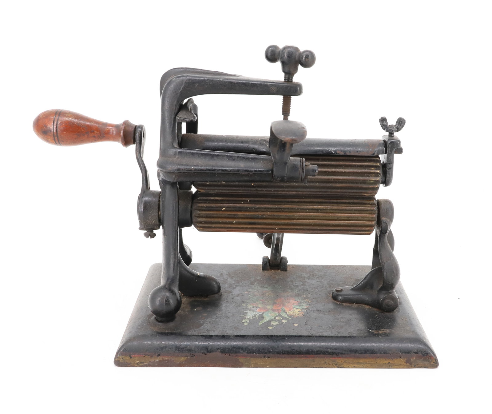 ANTIQUE FLUTING MACHINE: UNIVERSAL FLUTING MACHINE #2. BRASS ROLLERS 6" L., PAINTED SURFACE WITH FLOWERS. CLAMP. PLEASE READ CAREFULLY - ITEMS MUST BE PAID FOR THROUGH LIVE AUCTIONEERS OR WITH CASH OR CHECK IN PERSON - Terms 