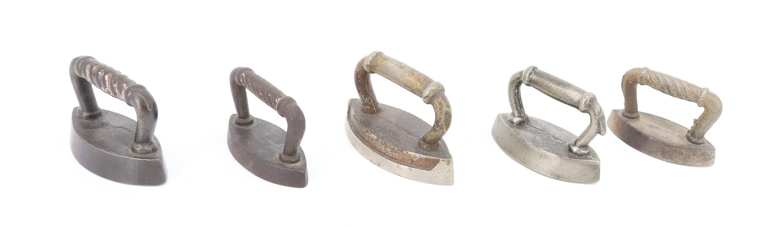 (5) MINIATURE DOUBLE-POINT SAD IRONS: ONE WITH UNUSUAL POLISHING END AND THUMB REST. 2 3/4" TO 3 1/3" LENGTHS. PLEASE READ CAREFULLY - ITEMS MUST BE PAID FOR THROUGH LIVE AUCTIONEERS OR WITH CASH OR CHECK IN PERSON - Terms for Purchasing