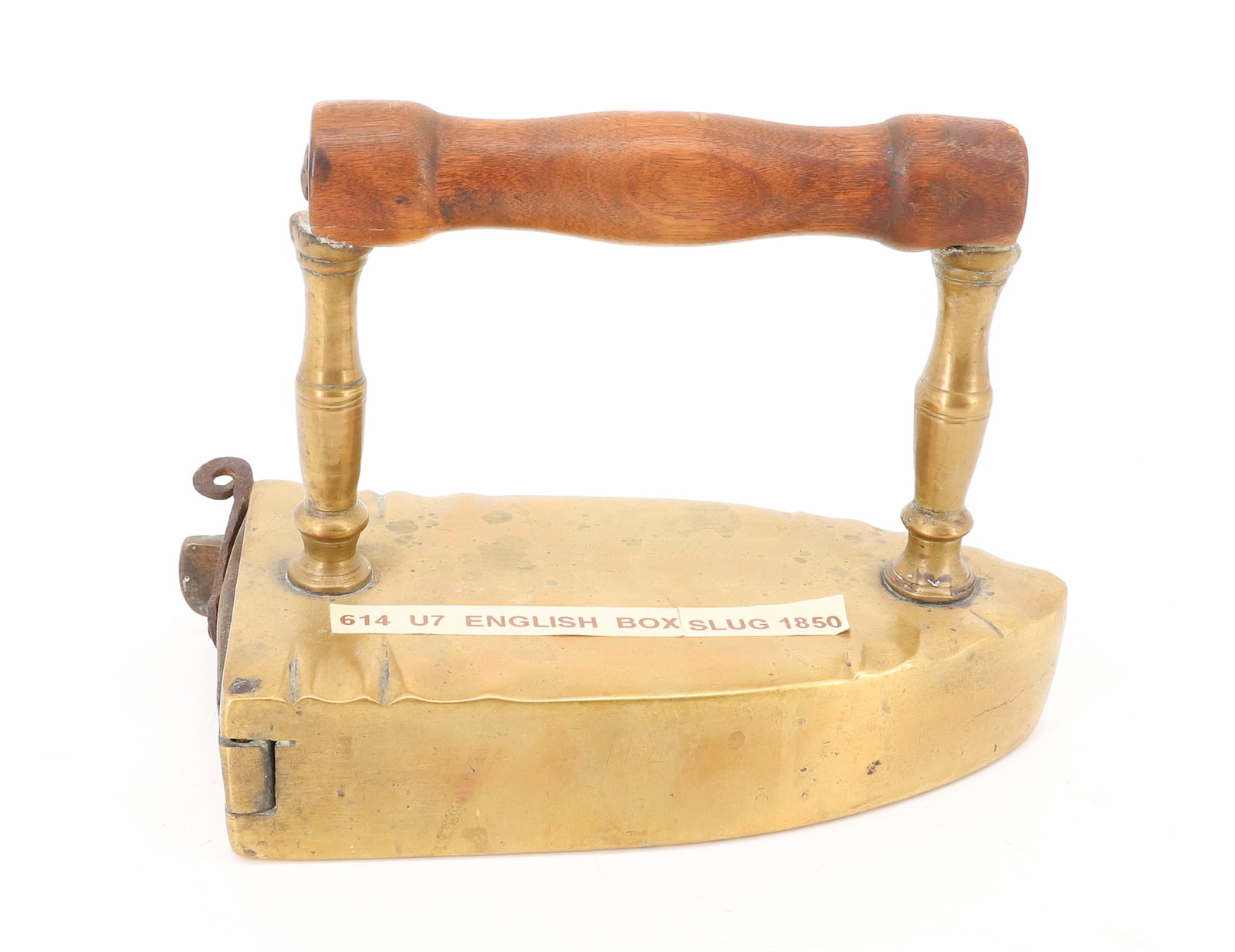 19TH C. ENGLISH BOX IRON: BRASS BOX IRON WITH REAR SWING GATE, TURNED POSTS, WOODEN HANDLE. CA. 1850. 7 1/2" L. PLEASE READ CAREFULLY - ITEMS MUST BE PAID FOR THROUGH LIVE AUCTIONEERS OR WITH CASH OR CHECK IN PERSON - Terms