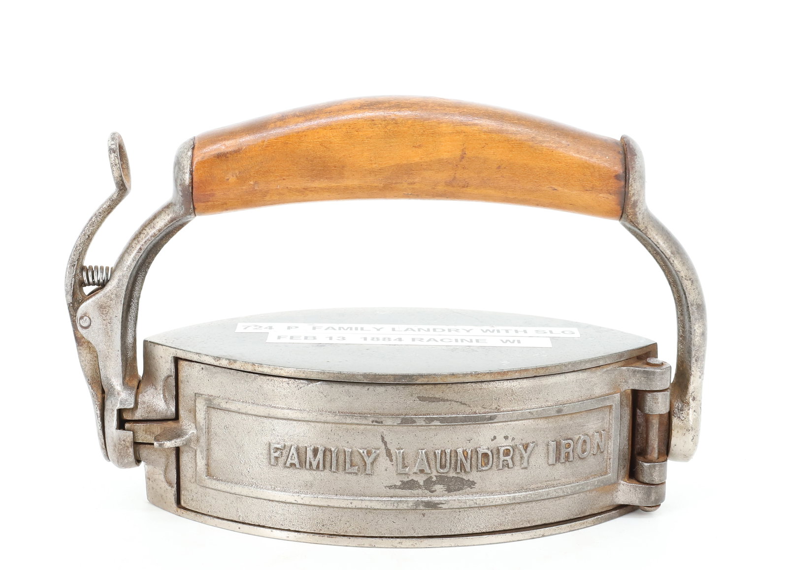 REVOLVING "FAMILY LAUNDRY" IRON: REVOLVING HANDLE W/ SLUG. RACINE, WI, 1884. 7 1/2" L. PLEASE READ CAREFULLY - ITEMS MUST BE PAID FOR THROUGH LIVE AUCTIONEERS OR WITH CASH OR CHECK IN PERSON - Terms for Purchasing and Shipping of Auc