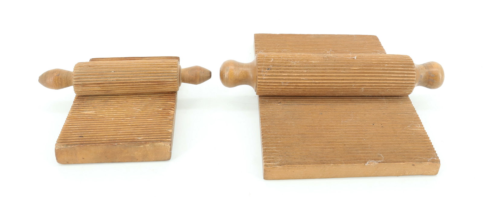 (2) CRIMPING BOARDS AND ROLLERS: TWO DUTCH HAND CARVED RUFFLERS CA. 1800. 4 1/2" X 3" AND 7 1/8" X 5 1/8". PLEASE READ CAREFULLY - ITEMS MUST BE PAID FOR THROUGH LIVE AUCTIONEERS OR WITH CASH OR CHECK IN PERSON - Terms for