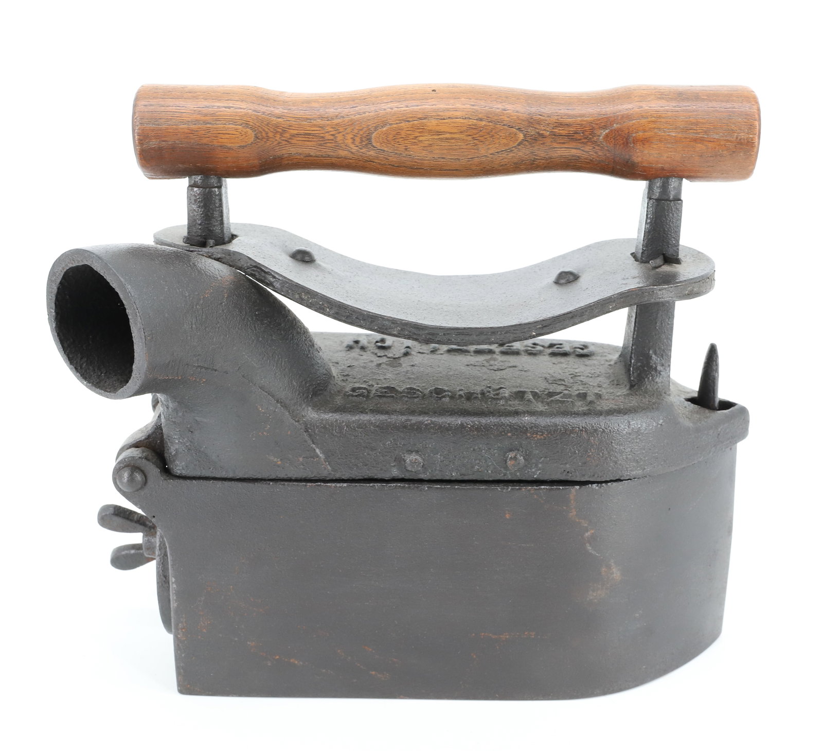 GERMAN CHARCOAL IRON: FRONT TURN PEG LATCH. REAR DAMPER AND CHIMNEY. MRKD. GESETZLICH ON TOP. 9" L. PLEASE READ CAREFULLY - ITEMS MUST BE PAID FOR THROUGH LIVE AUCTIONEERS OR WITH CASH OR CHECK IN PERSON - Terms for