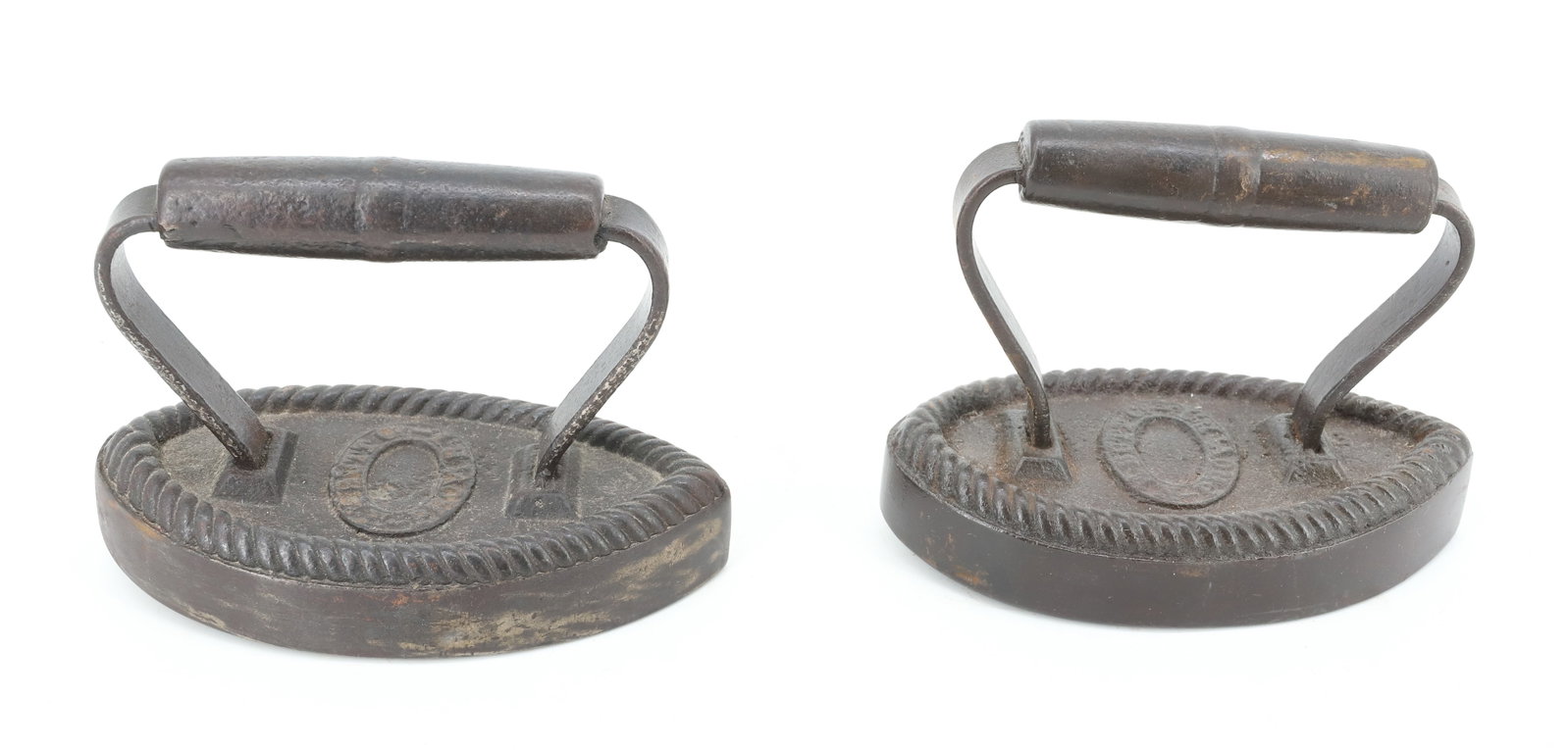 (2) NEW ENGLAND BUTT IRON: CA. 1870S. EMBOSSED TOPS WITH ROUND TEARDROP SHAPED BODIES. 5" L. PLEASE READ CAREFULLY - ITEMS MUST BE PAID FOR THROUGH LIVE AUCTIONEERS OR WITH CASH OR CHECK IN PERSON - Terms for Purchasing and Shi