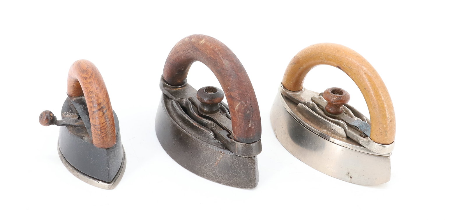 (3) SMALL SIZE DETACHABLE HANDLE IRONS: (2) MRS. POTTS DOUBLE POINT AND ONE SAD IRON WITH DOUBLE POINTS. 3 1/2" TO 4 3/4". PLEASE READ CAREFULLY - ITEMS MUST BE PAID FOR THROUGH LIVE AUCTIONEERS OR WITH CASH OR CHECK IN PERSON - Terms for
