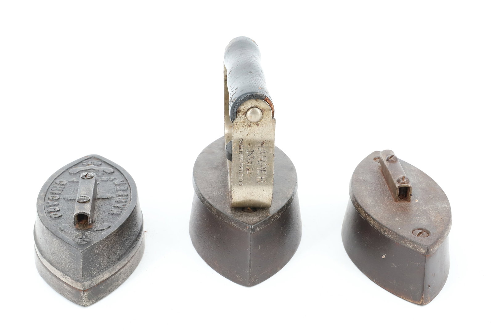 HARPER NO. 1 DETACHABLE HANDLE IRON: THREE BASES. ONE MRKD. HARPER, CHICAGO. PAT. AUG 27, 07. HANDLE PAT. JULY 5, 10. BASES 6" TO 6 1/2" LENGTHS. PLEASE READ CAREFULLY - ITEMS MUST BE PAID FOR THROUGH LIVE AUCTIONEERS OR WITH CASH OR