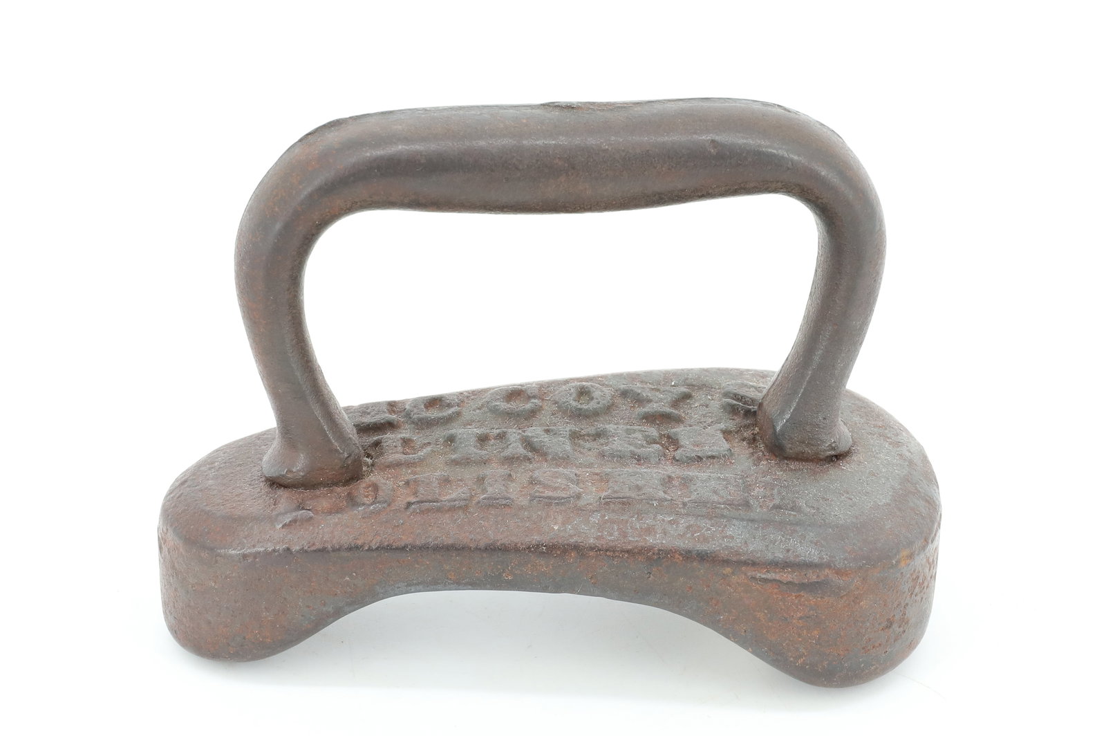ANTIQUE MCCOY'S POLISHING IRON: CAST IRON MRKD. MCCOYS LINEN POLISHER. 5" L. PLEASE READ CAREFULLY - ITEMS MUST BE PAID FOR THROUGH LIVE AUCTIONEERS OR WITH CASH OR CHECK IN PERSON - Terms for Purchasing and Shipping of Auction Item