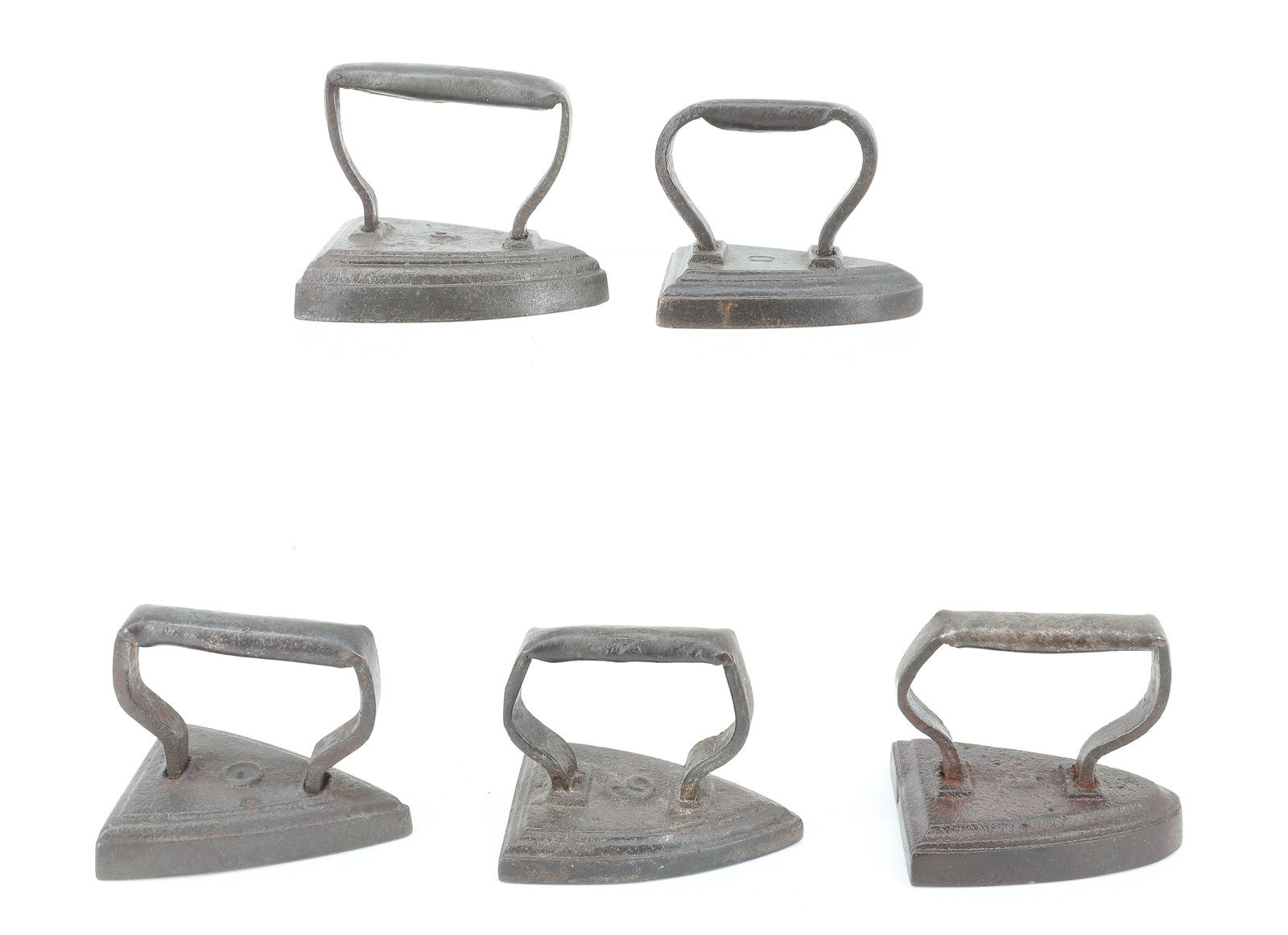 LOT OF (5) SMALL HOLLOW GRIP IRONS: CAST IRON WITH METAL GRIPS. EMBOSSED NUMBER MARKINGS ON TOPS. ONE LABELED "GLISSMAN". 3" TO 3 1/2" LENGTHS. PLEASE READ CAREFULLY - ITEMS MUST BE PAID FOR THROUGH LIVE AUCTIONEERS OR WITH CASH OR CHEC