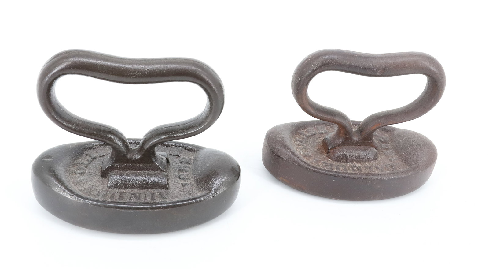 (2) 19TH C. POLISHING IRONS: MRKD. "LAUNDRY POLISH IRON" 1852. 4 3/4" L. PLEASE READ CAREFULLY - ITEMS MUST BE PAID FOR THROUGH LIVE AUCTIONEERS OR WITH CASH OR CHECK IN PERSON - Terms for Purchasing and Shipping of Auction