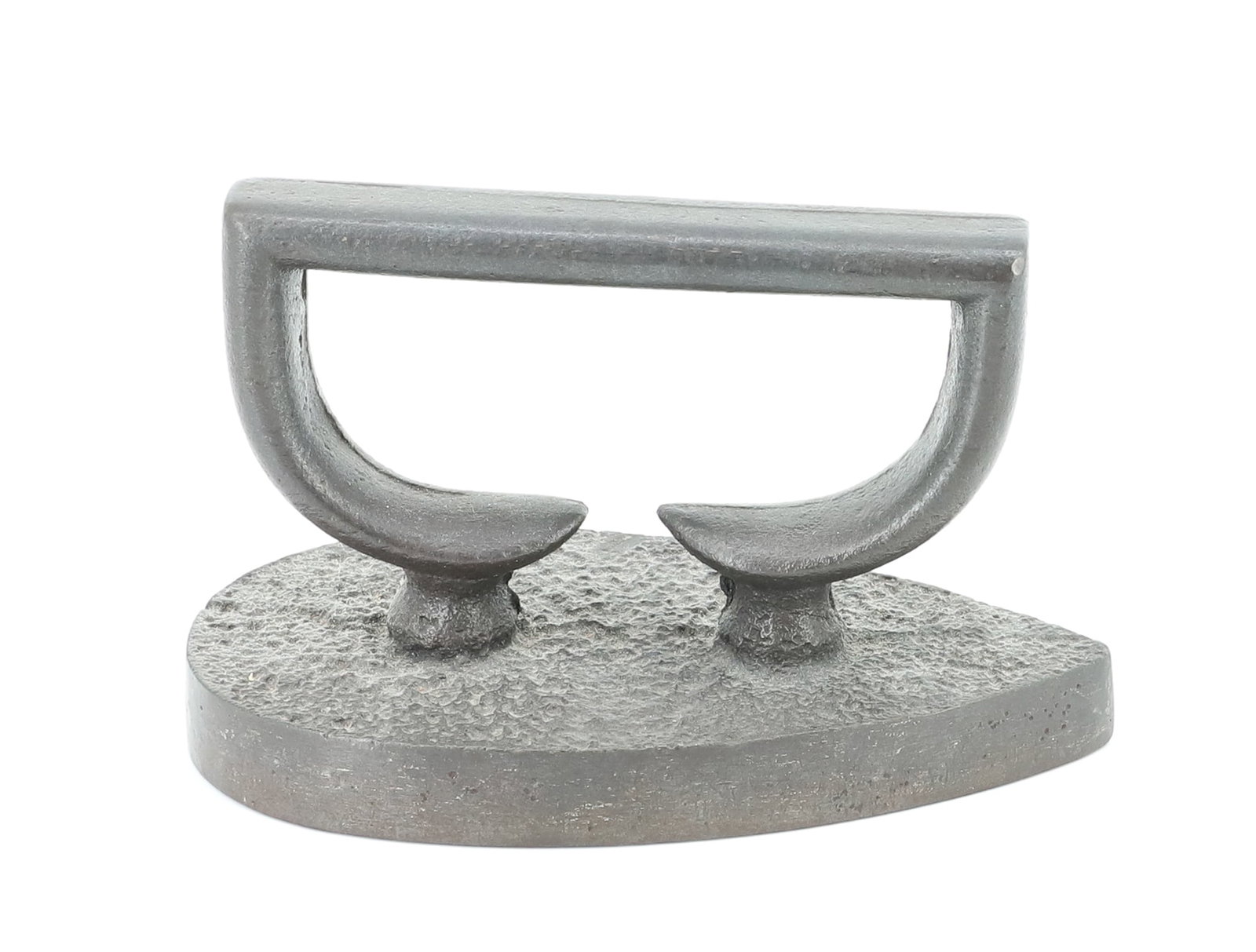 TEARDROP SHAPED FLAT IRON: UNUSUAL HANDLE. 6 1/2" L. PLEASE READ CAREFULLY - ITEMS MUST BE PAID FOR THROUGH LIVE AUCTIONEERS OR WITH CASH OR CHECK IN PERSON - Terms for Purchasing and Shipping of Auction Items. Please read care