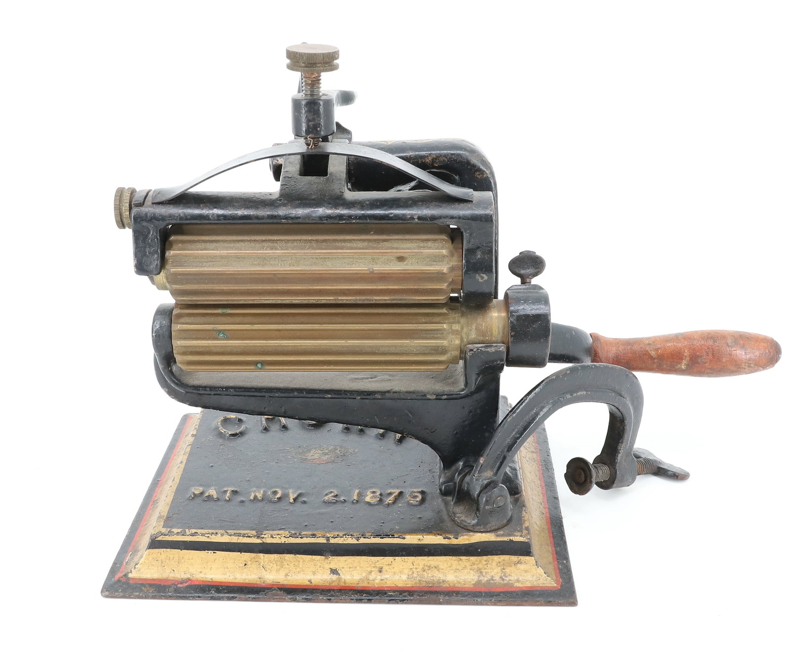 CROWN FLUTING MACHINE: SMALL SIZE. ORIGINAL PAINTED SURFACE. PATENT NOV. 2, 1875. BRASS ROLLERS 4 1/2" L. PLEASE READ CAREFULLY - ITEMS MUST BE PAID FOR THROUGH LIVE AUCTIONEERS OR WITH CASH OR CHECK IN PERSON - Terms for P