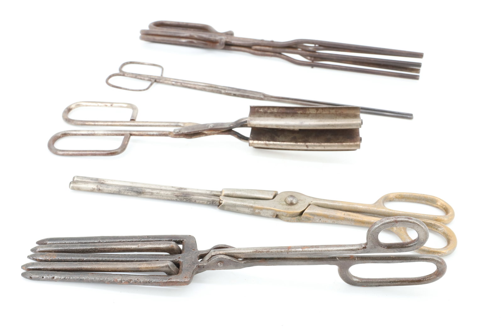 ANTIQUE CURLING IRON LOT: (5) IRONS WITH VARIOUS STYLES AND ENDS. 9 1/8" L. TO 11" L. PLEASE READ CAREFULLY - ITEMS MUST BE PAID FOR THROUGH LIVE AUCTIONEERS OR WITH CASH OR CHECK IN PERSON - Terms for Purchasing and Shipping
