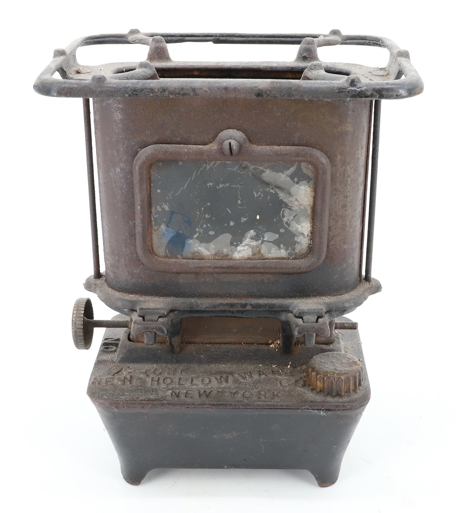 IDEAL CAST IRON STOVE, SAD IRON HEATER: MRKD. "NEW YORK, HOLLOW WARE CO." 8 1/4" X 6" X 4". PLEASE READ CAREFULLY - ITEMS MUST BE PAID FOR THROUGH LIVE AUCTIONEERS OR WITH CASH OR CHECK IN PERSON - Terms for Purchasing and Shipping of