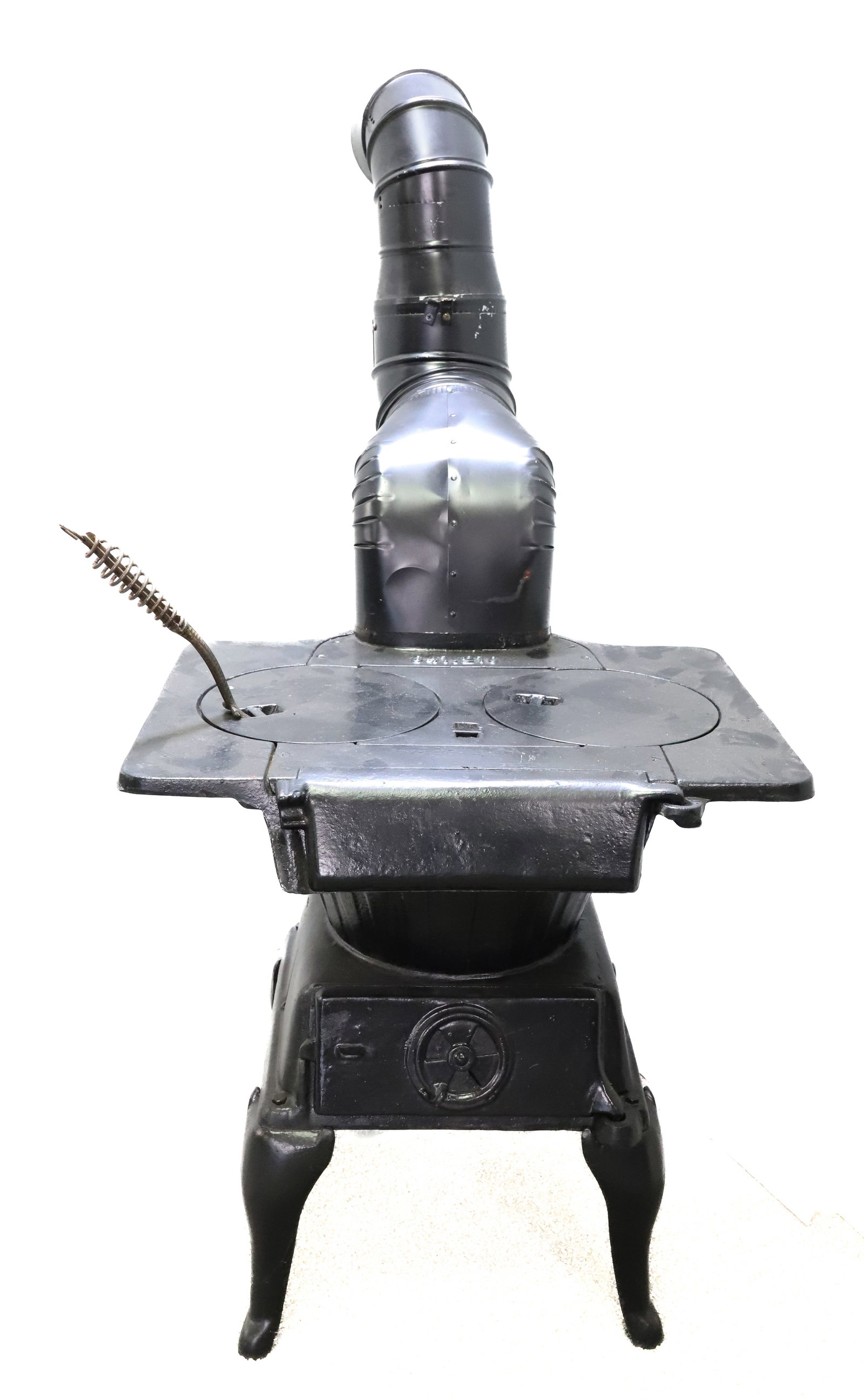 LITTLE JOE CAST IRON LAUNDRY STOVE: USED FOR HEATING WATER FOR LAUNDRY AND HEATING SAD IRONS. MRKD. 641.210. TWO BURNERS. CONTEMPORARY STOVE PIPE. BLACK PAINTED SURFACES. 21" X 21" X 17" (WITHOUT PIPE). PLEASE READ CAREFULLY - ITEMS