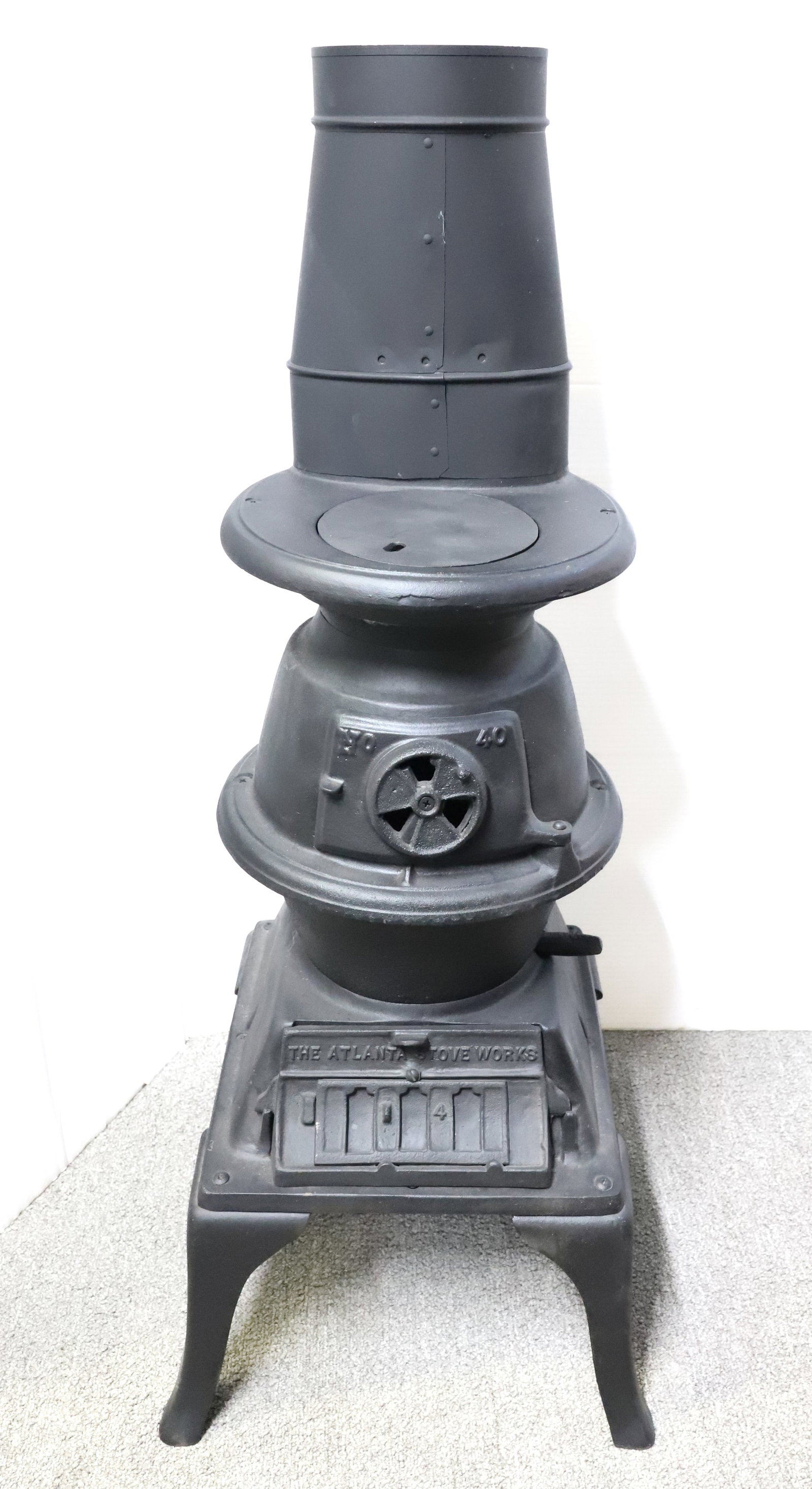 THE ATLANTA STOVE WORKS, NO. 40: POT BELLY STOVE. MRKD. ON BACK "1889 CONESTOGA". 25 1/4" X 12" X 13". PLEASE READ CAREFULLY - ITEMS MUST BE PAID FOR THROUGH LIVE AUCTIONEERS OR WITH CASH OR CHECK IN PERSON - Terms for Purchasing