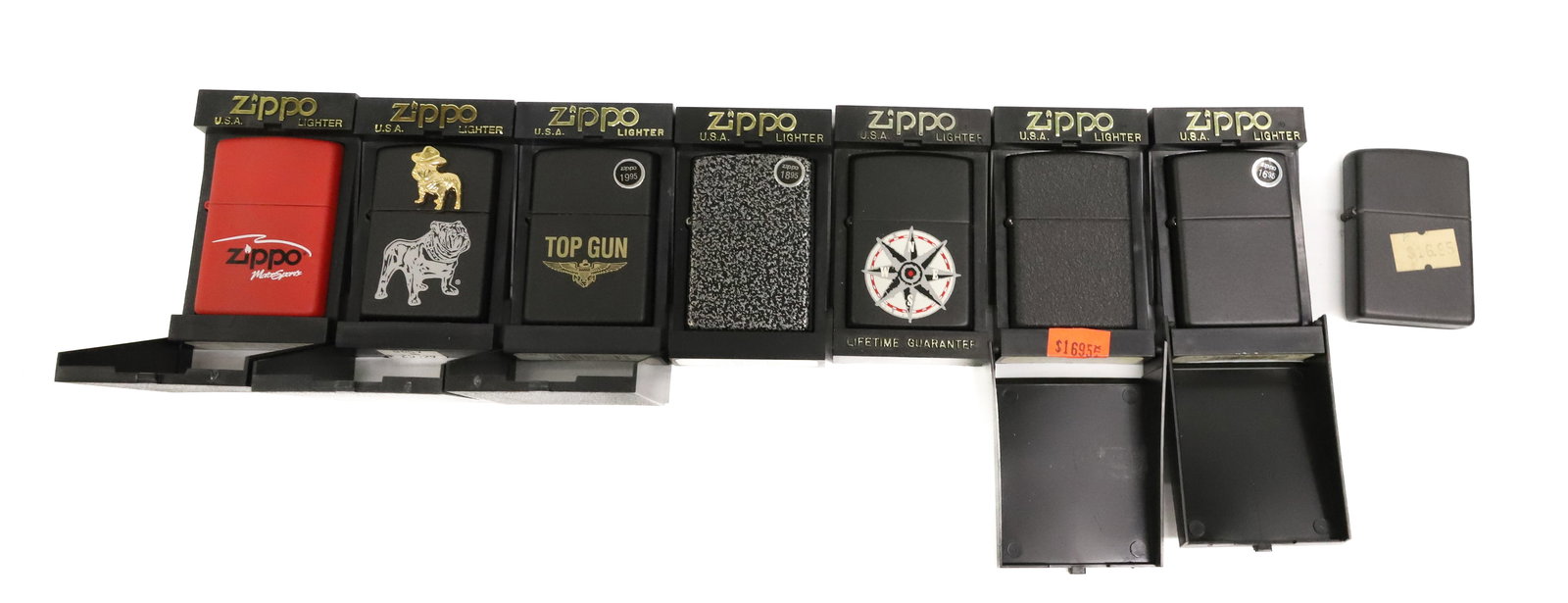 (8) Zippo Lighters, New in Boxes: Various Styles and Colors. One does not have box. PLEASE READ CAREFULLY - ITEMS MUST BE PAID FOR THROUGH LIVE AUCTIONEERS OR WITH CASH OR CHECK IN PERSON - Terms for Purchasing and Shipping of Auction