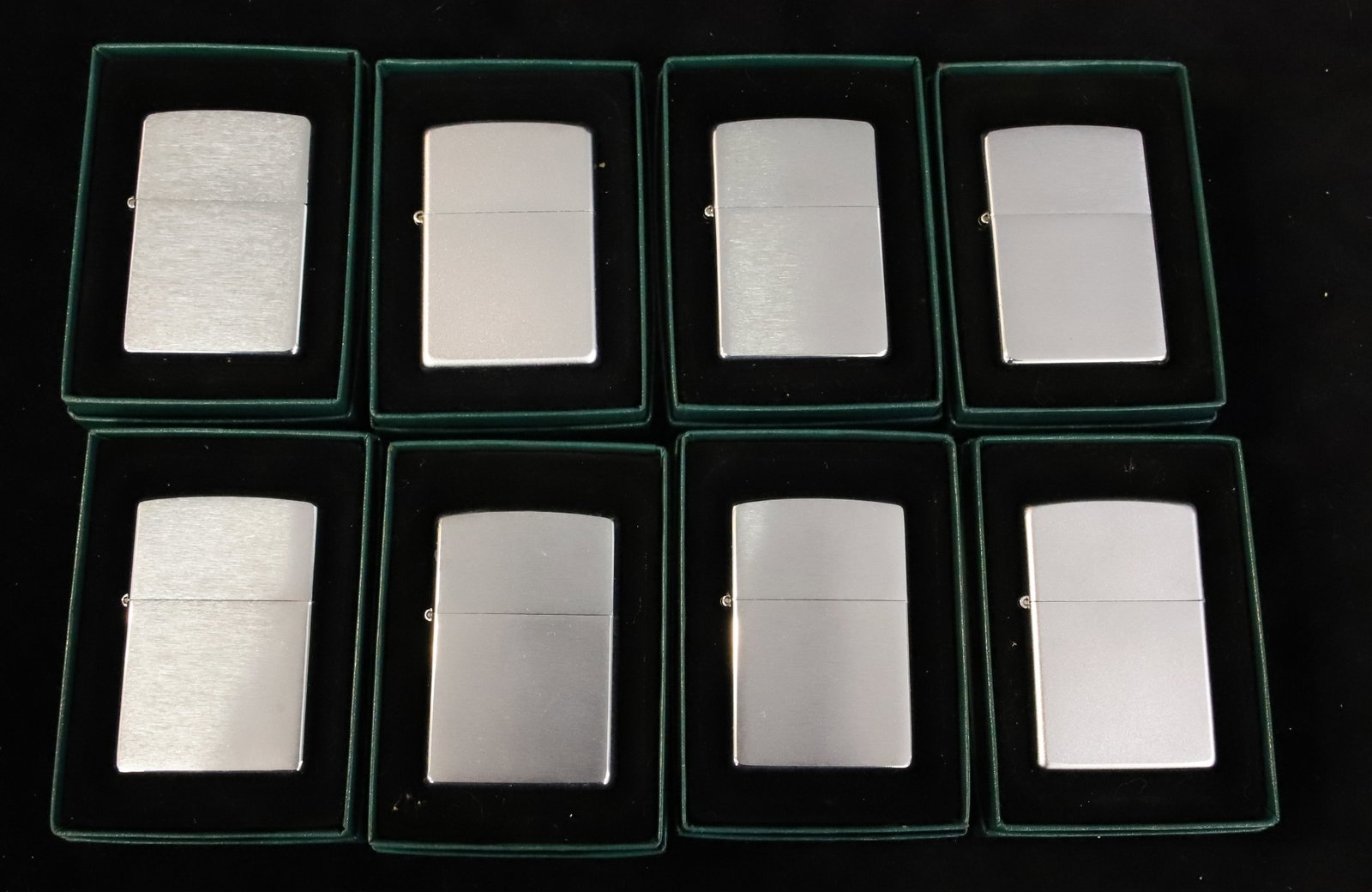 (8) Zippo Lighters, New in Boxes: Brushed Metal. PLEASE READ CAREFULLY - ITEMS MUST BE PAID FOR THROUGH LIVE AUCTIONEERS OR WITH CASH OR CHECK IN PERSON - Terms for Purchasing and Shipping of Auction Items. Please read carefully befor