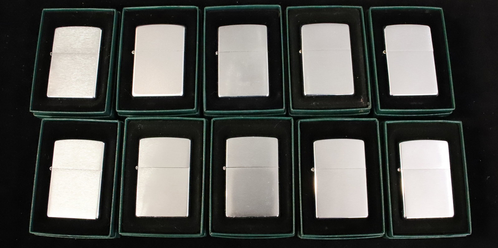 (10) Zippo Lighters, New in Boxes: Brushed Metal. PLEASE READ CAREFULLY - ITEMS MUST BE PAID FOR THROUGH LIVE AUCTIONEERS OR WITH CASH OR CHECK IN PERSON - Terms for Purchasing and Shipping of Auction Items. Please read carefully befor