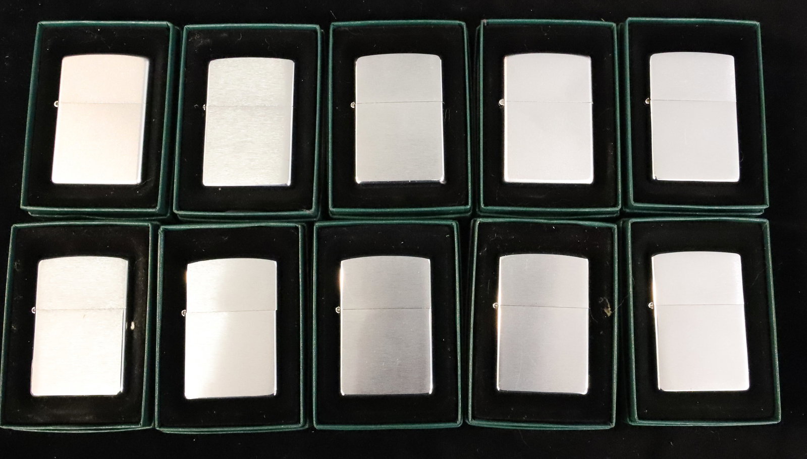 (10) Zippo Lighters, New in Boxes: Brushed Metal. PLEASE READ CAREFULLY - ITEMS MUST BE PAID FOR THROUGH LIVE AUCTIONEERS OR WITH CASH OR CHECK IN PERSON - Terms for Purchasing and Shipping of Auction Items. Please read carefully befor