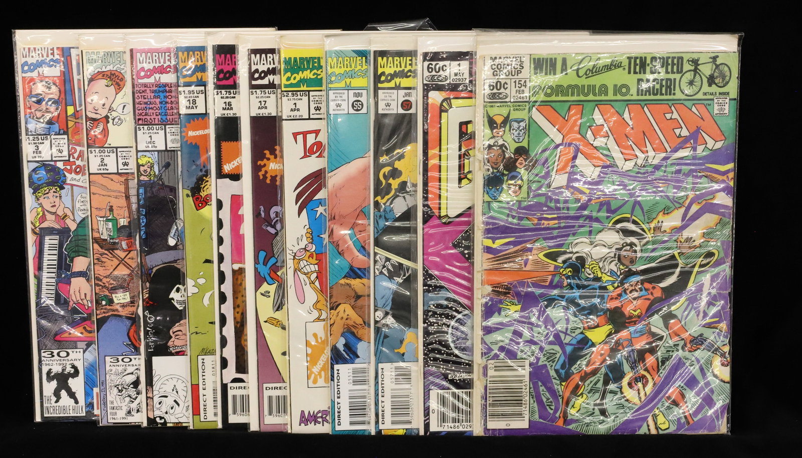 (11) Marvel Comic Books: Including: X-Men, Galactus the Origin, (2) Ghost Rider, (4) Ren & Stimpy Show and (3) Bill & Ted's Excellent Comic Books. PLEASE READ CAREFULLY - ITEMS MUST BE PAID FOR THROUGH LIVE AUCTIONEERS OR WIT