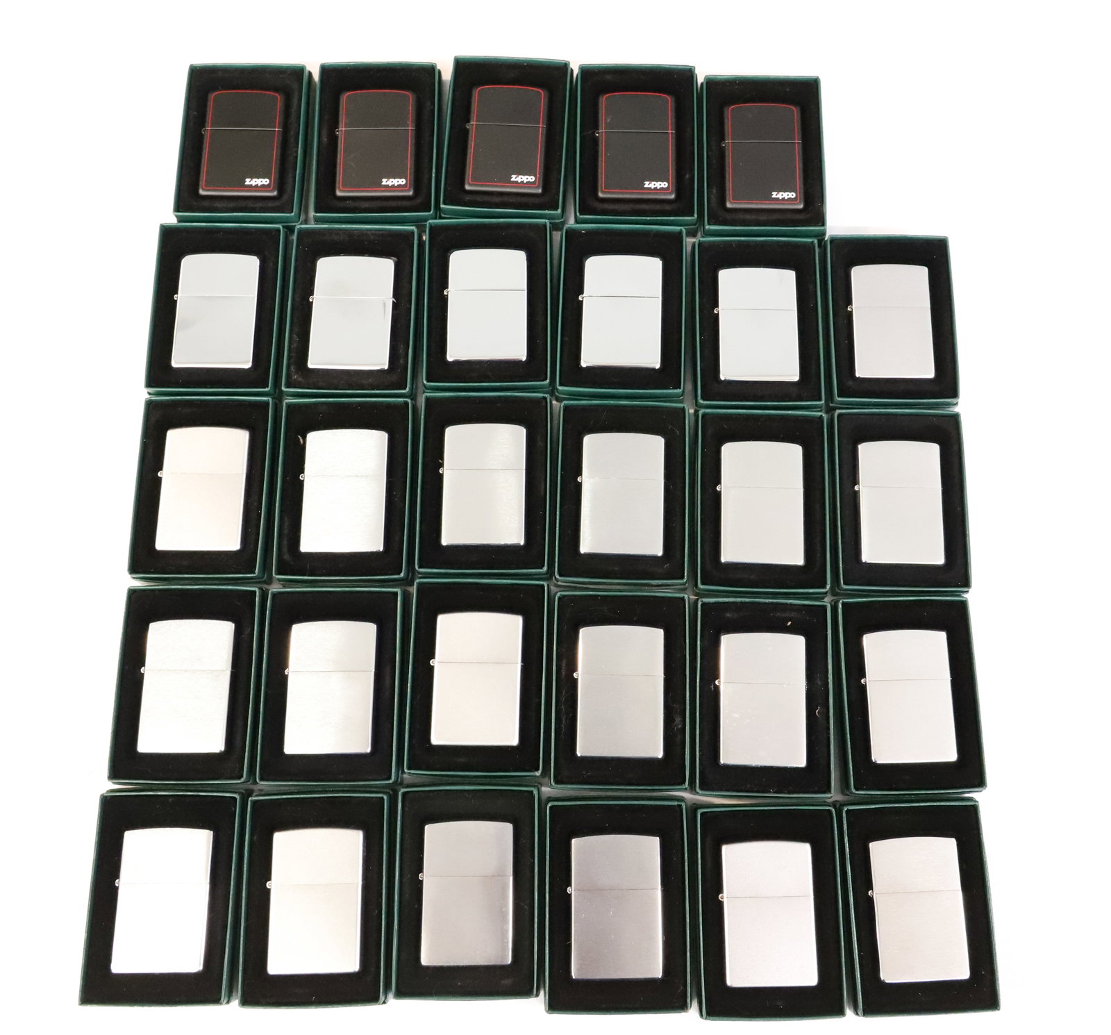 (29) Zippo Lighters New in Box: Shiny, Brushed and Black Finishes. PLEASE READ CAREFULLY - ITEMS MUST BE PAID FOR THROUGH LIVE AUCTIONEERS OR WITH CASH OR CHECK IN PERSON - Terms for Purchasing and Shipping of Auction Items. Please
