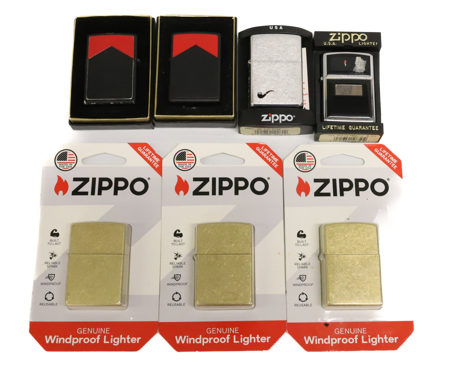 (7) Zippo Lighters, New in Box: Including: (3) Windproof and More. (2) BLACK/RED ARE USED. PLEASE READ CAREFULLY - ITEMS MUST BE PAID FOR THROUGH LIVE AUCTIONEERS OR WITH CASH OR CHECK IN PERSON - Terms for Purchasing and Shipping o