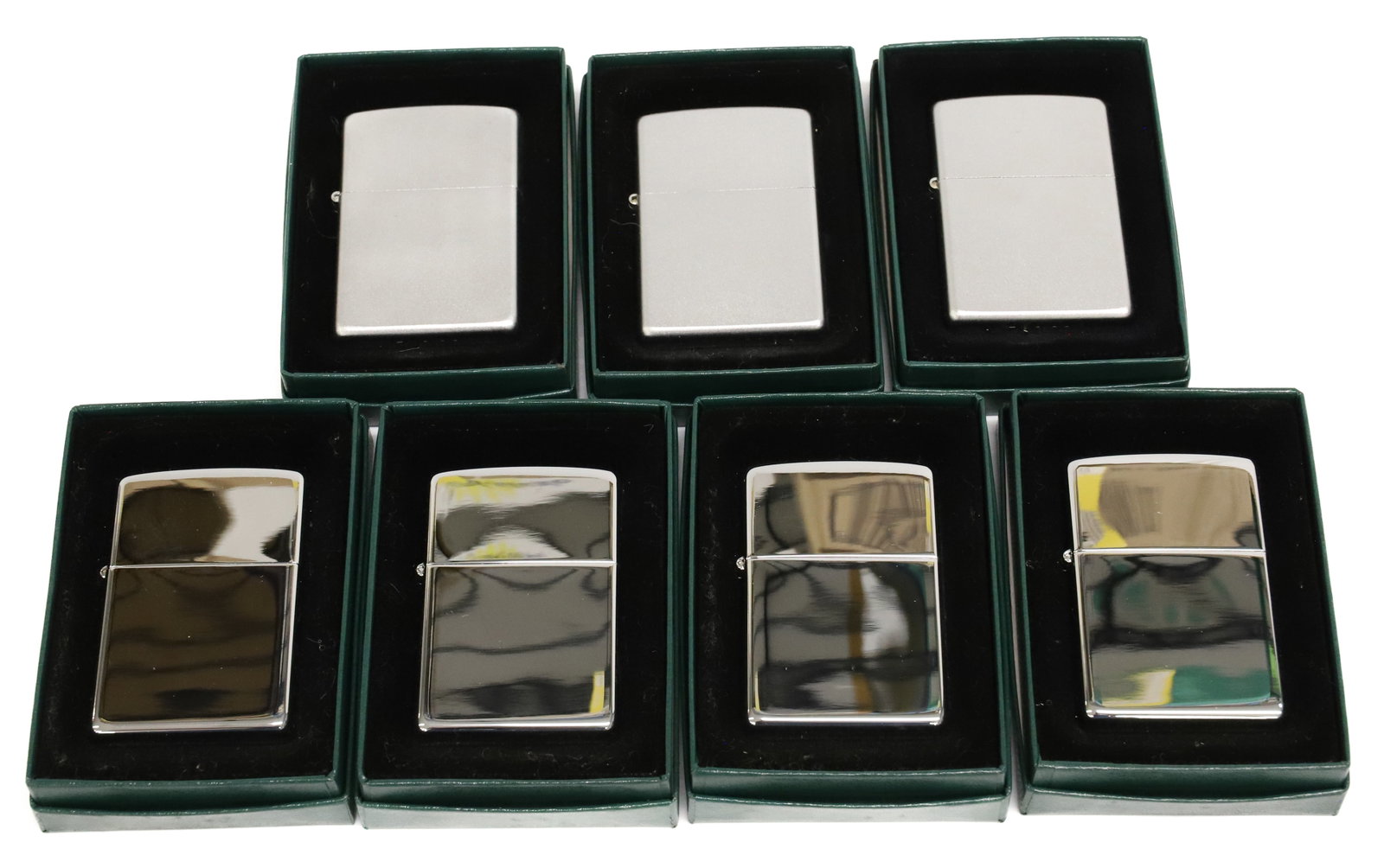 (7) Zippo Lighters, New in Box: Brushed and Shiny Metal. PLEASE READ CAREFULLY - ITEMS MUST BE PAID FOR THROUGH LIVE AUCTIONEERS OR WITH CASH OR CHECK IN PERSON - Terms for Purchasing and Shipping of Auction Items. Please read