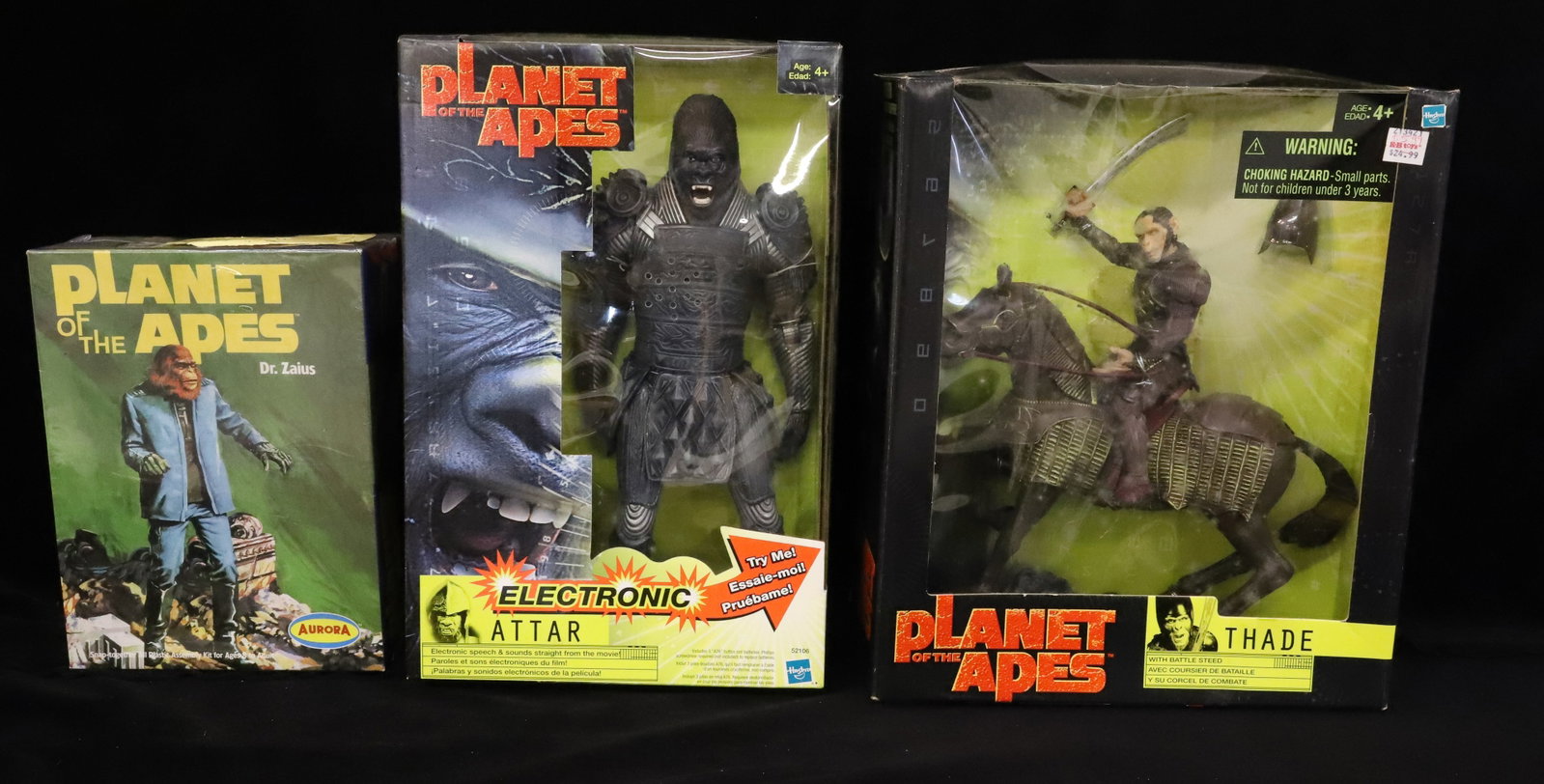 (3) Planet of the Apes Figures: Including: Dr. Zaius Snap-together Kit (aurora 2000), Electronic Attar (Hasbro) and Thade with Battle Steed (Hasbro). Original Boxes. PLEASE READ CAREFULLY - ITEMS MUST BE PAID FOR THROUGH LIVE AUCTIO