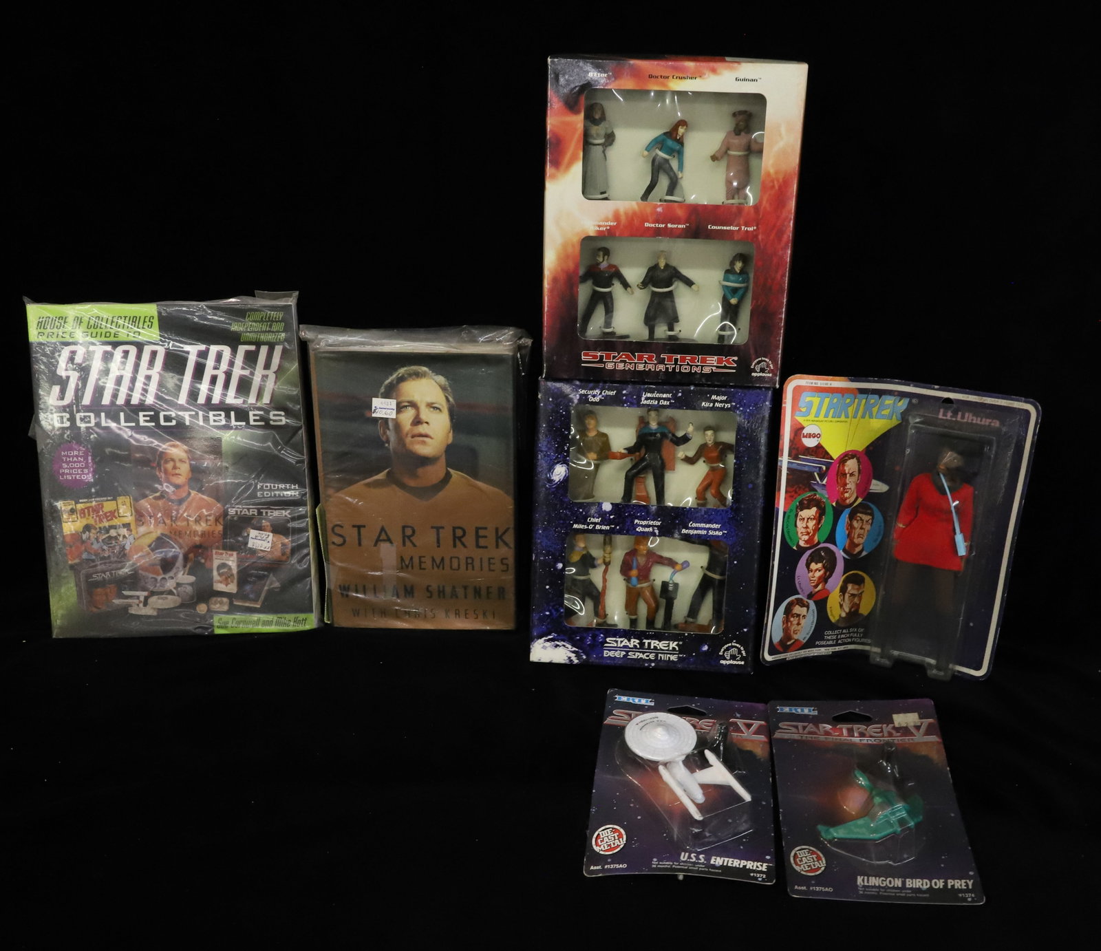 Lot of Star Trek Books and Collectibles: Books, Figures and Die-Cast Toys. PLEASE READ CAREFULLY - ITEMS MUST BE PAID FOR THROUGH LIVE AUCTIONEERS OR WITH CASH OR CHECK IN PERSON - Terms for Purchasing and Shipping of Auction Items. Please