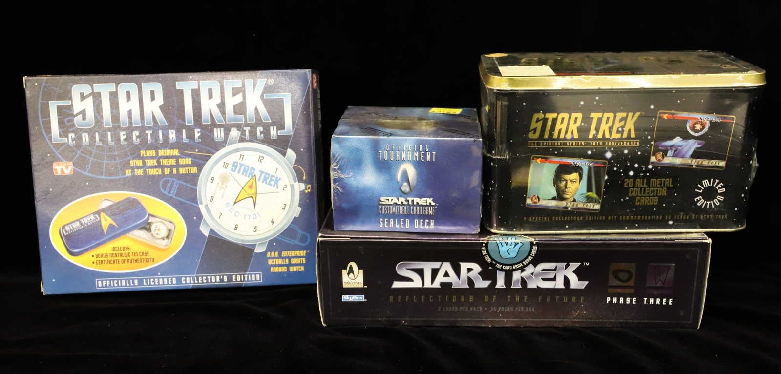 Lot of Star Trek Collector Cards and Watch: Original Boxes. PLEASE READ CAREFULLY - ITEMS MUST BE PAID FOR THROUGH LIVE AUCTIONEERS OR WITH CASH OR CHECK IN PERSON - Terms for Purchasing and Shipping of Auction Items. Please read carefully