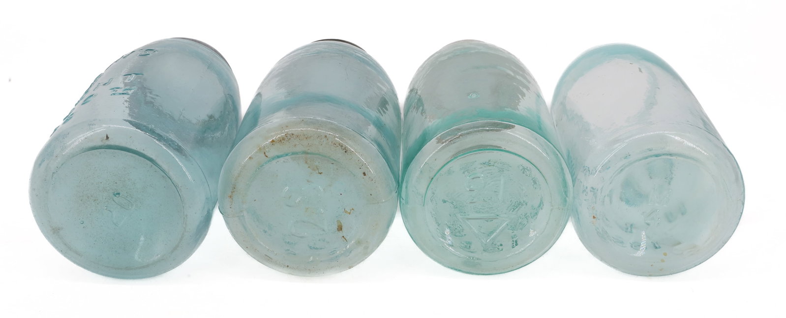 (4) MASON'S FRUIT JARS - 7