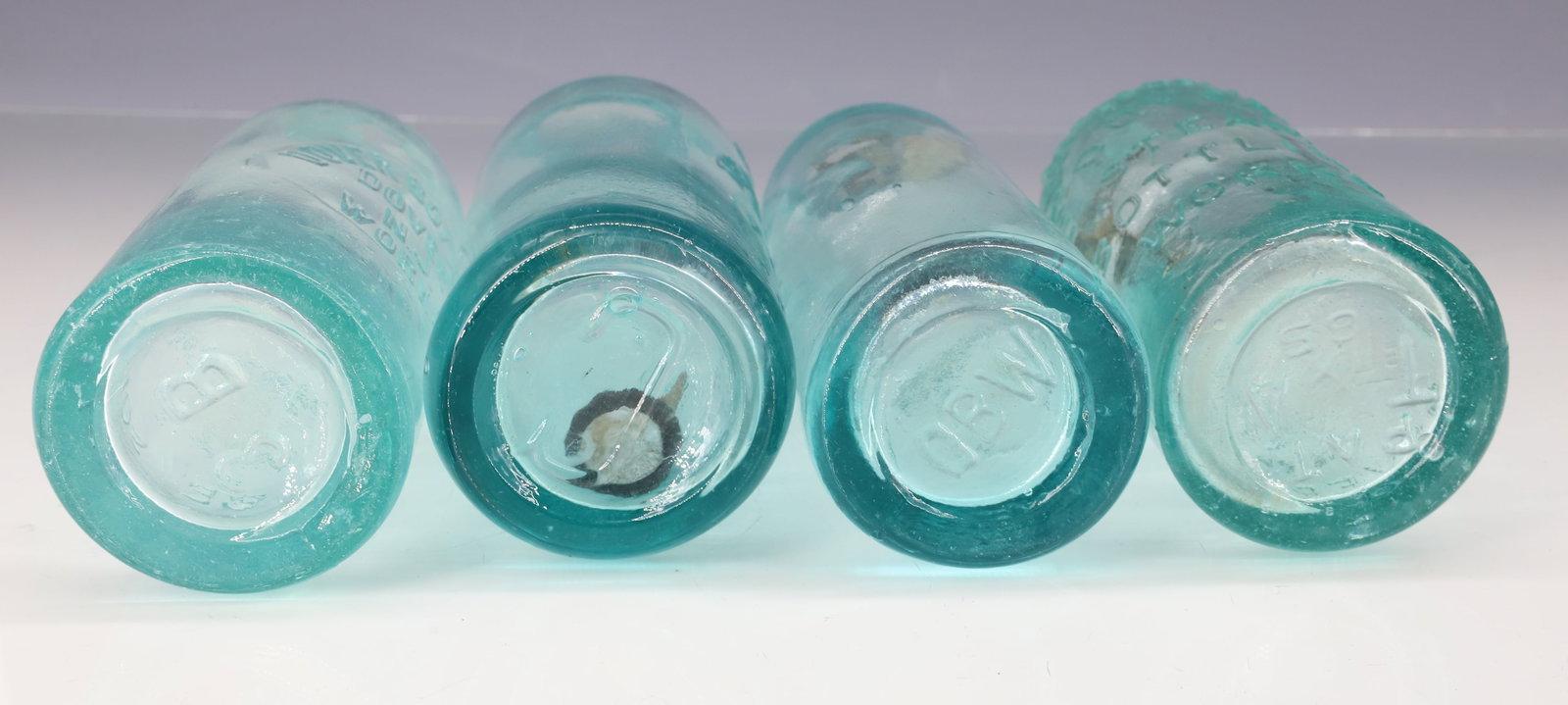 (4) DOVER, NJ BOTTLES - 6
