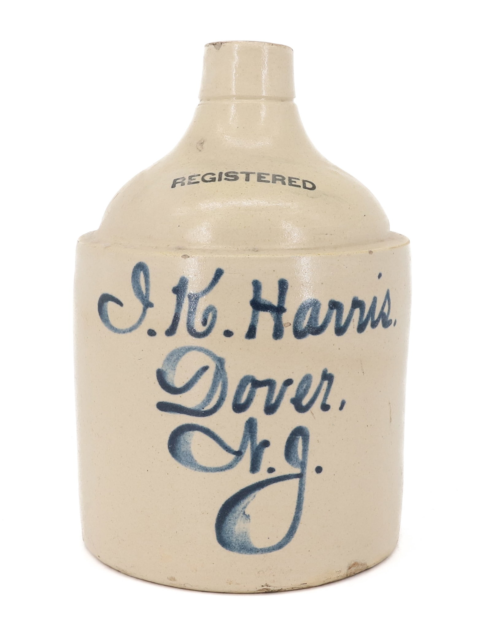 DOVER, NJ STONEWARE ADVERTISING JUG: J.K. HARRIS, DOVER, N.J. STAMPED "REGISTERED" 11" H. PLEASE READ CAREFULLY - ITEMS MUST BE PAID FOR THROUGH LIVE AUCTIONEERS OR WITH CASH OR CHECK IN PERSON - Terms for Purchasing and Shipping of Auct